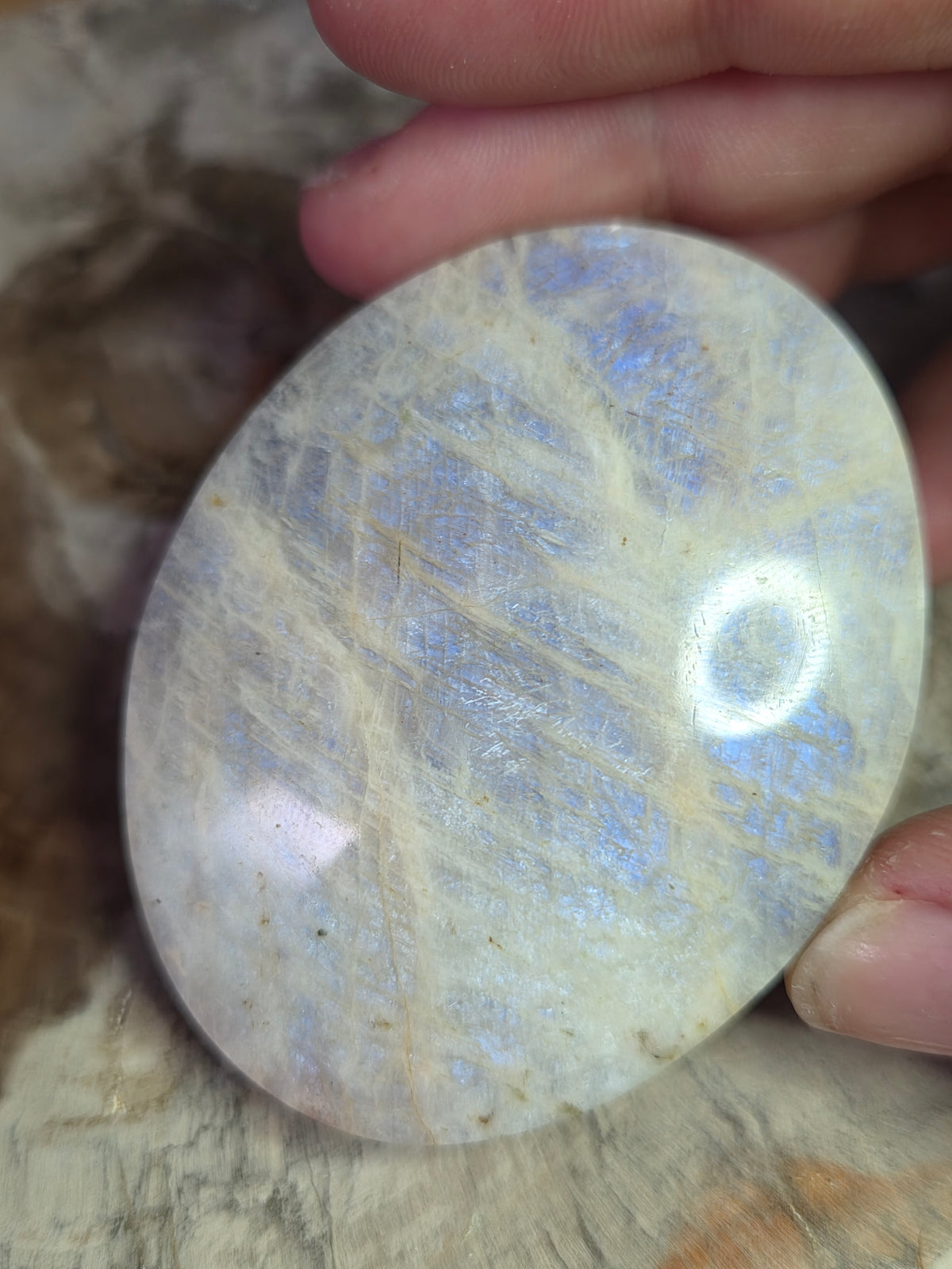 Beautiful crystal moonstone palm stone