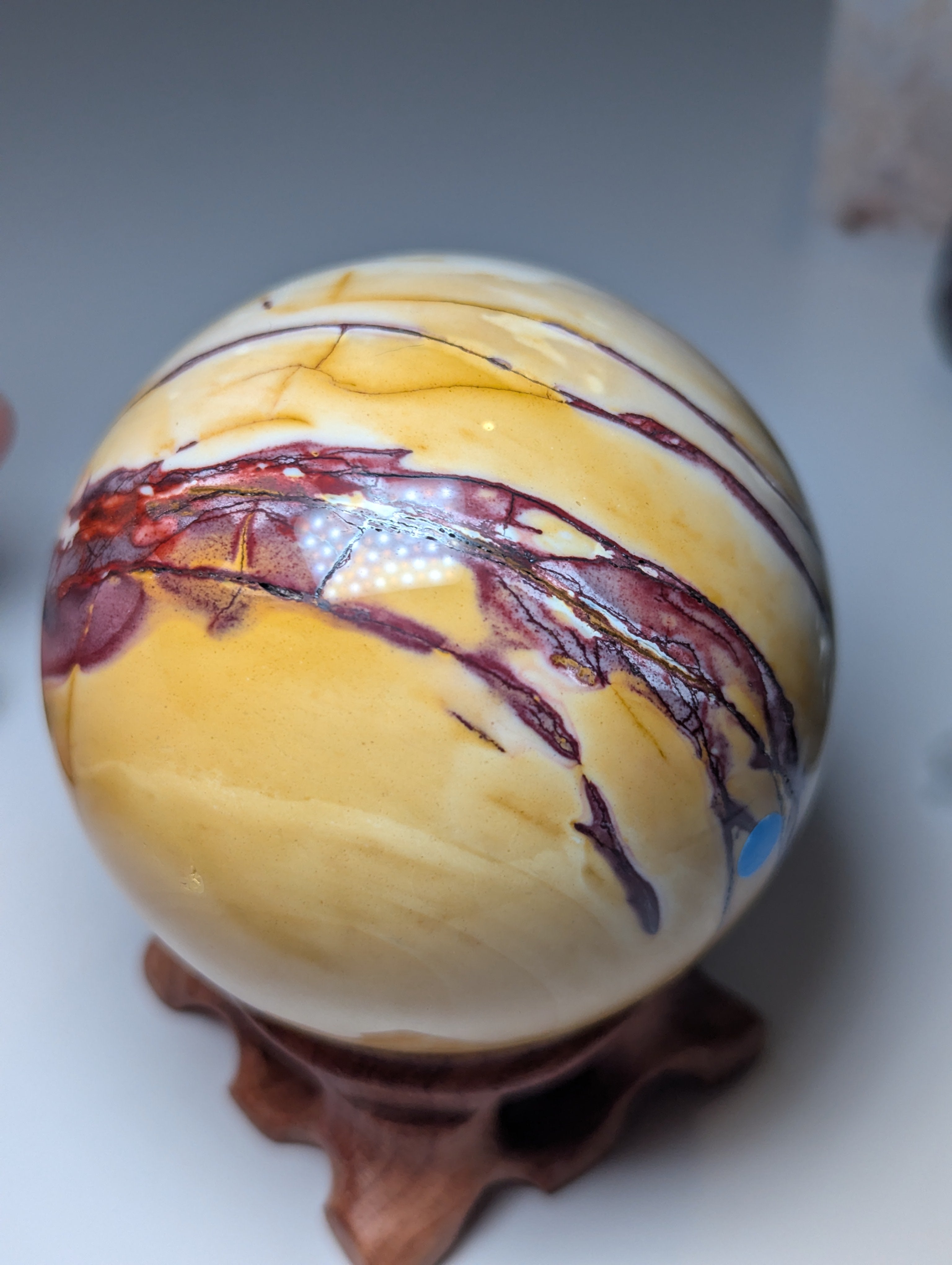 Mookaite crystal sphere with stand