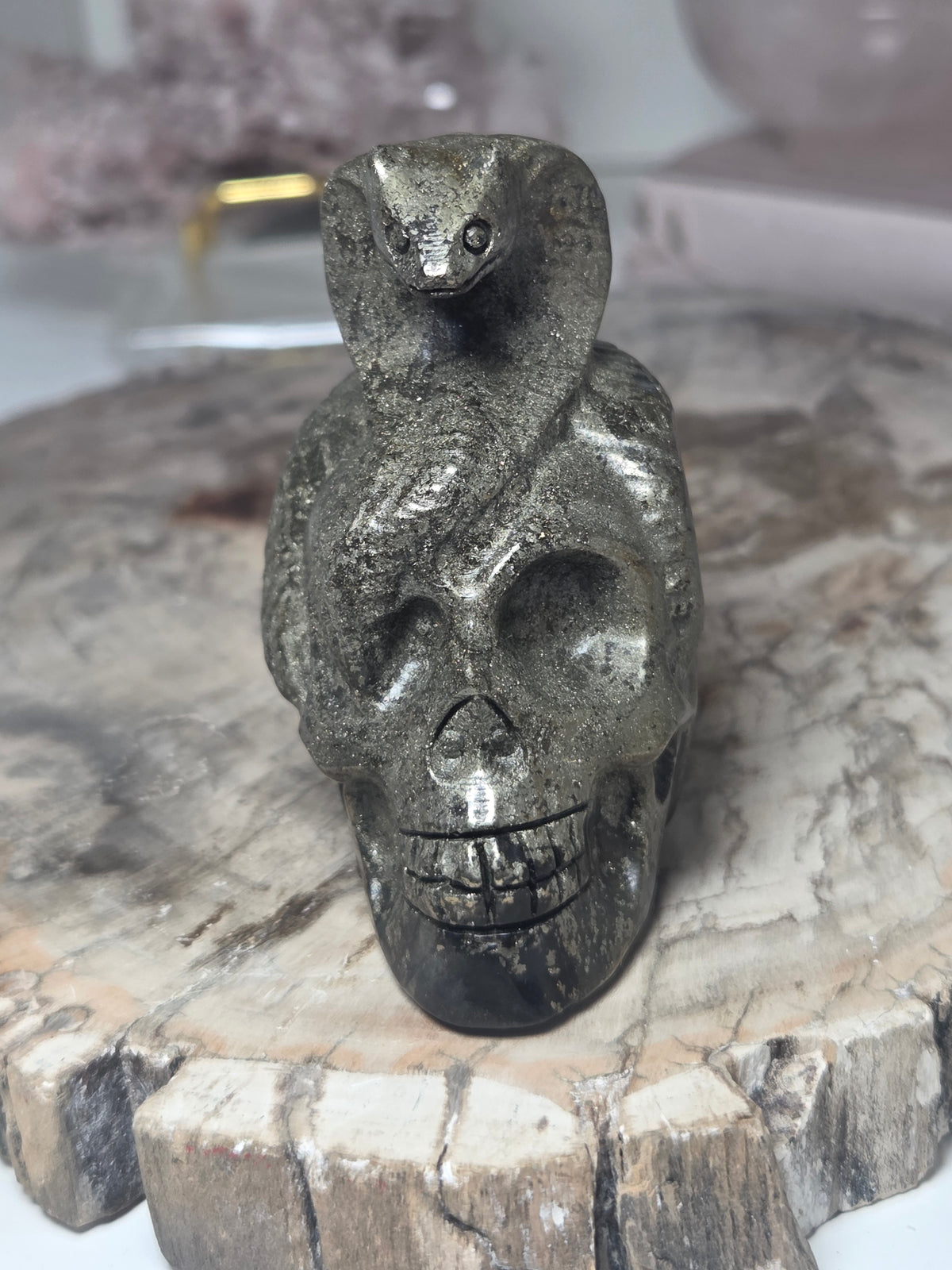 Pyrite crystal skull with Snake carving