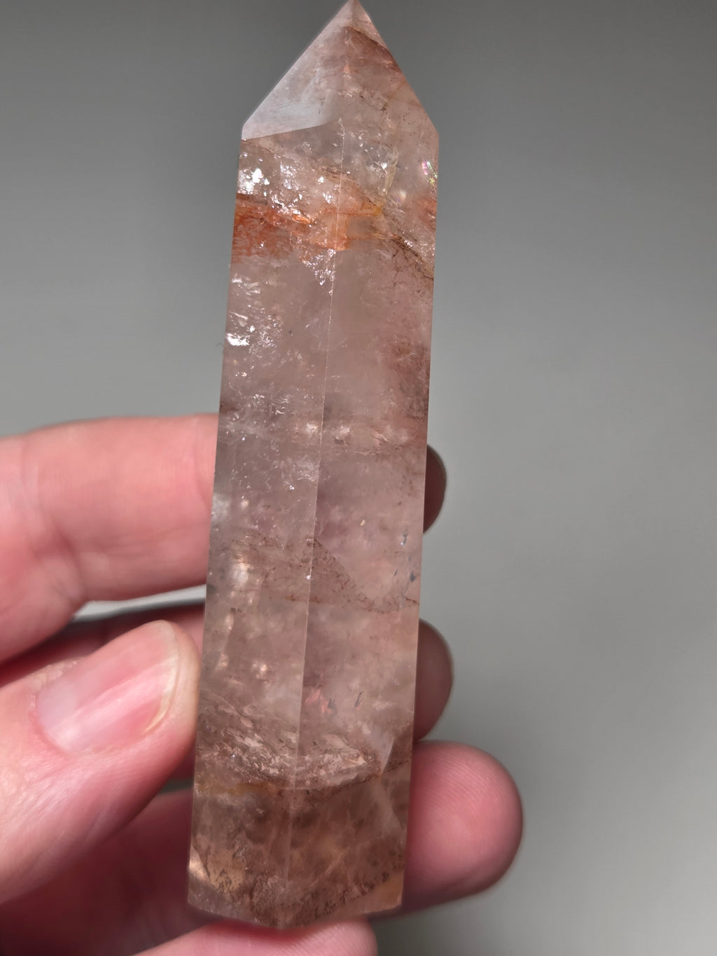 Fire quartz crystal tower with imperfections