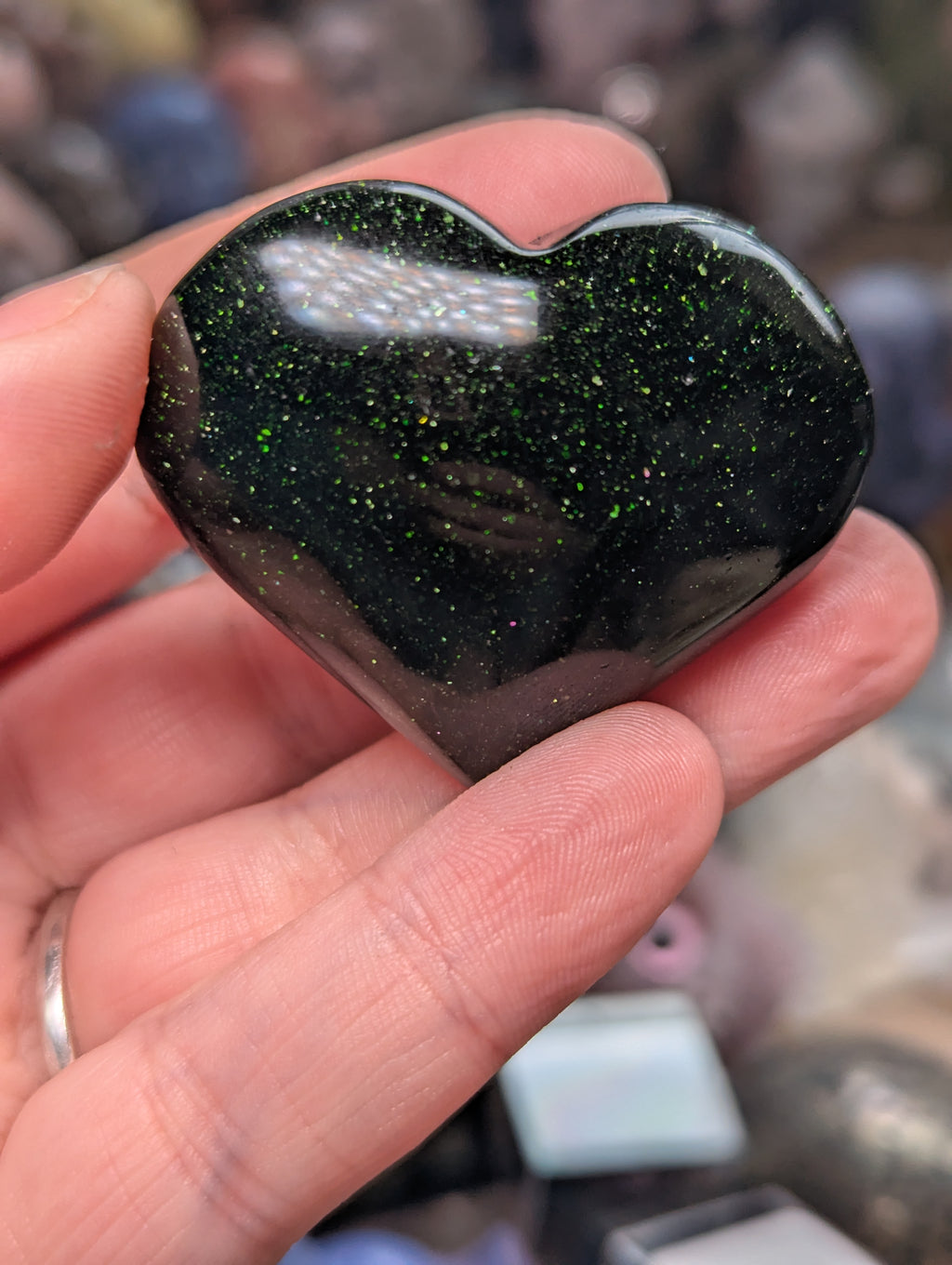 Green sandstone heart carving