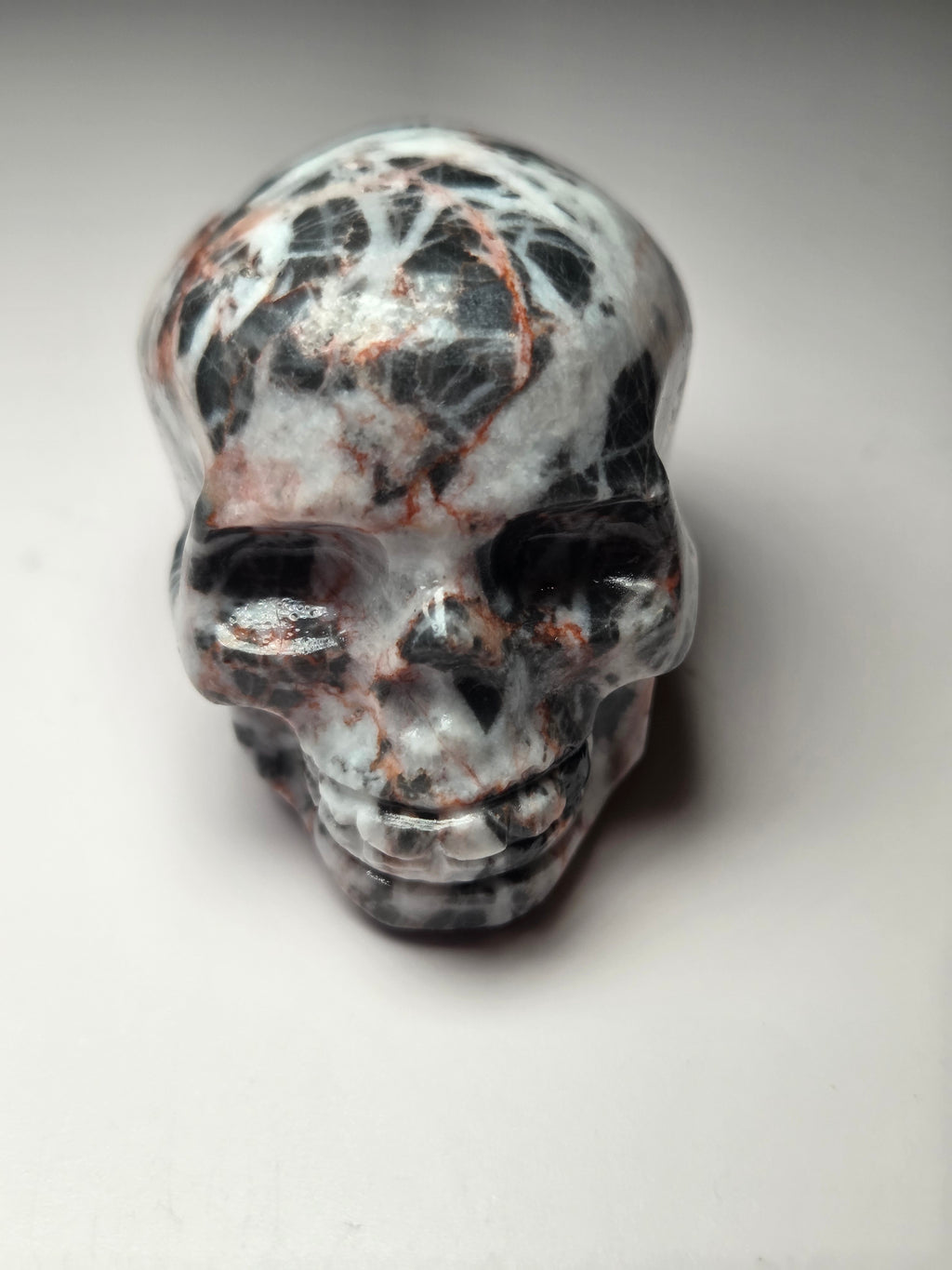 Red vain jasper crystal skull