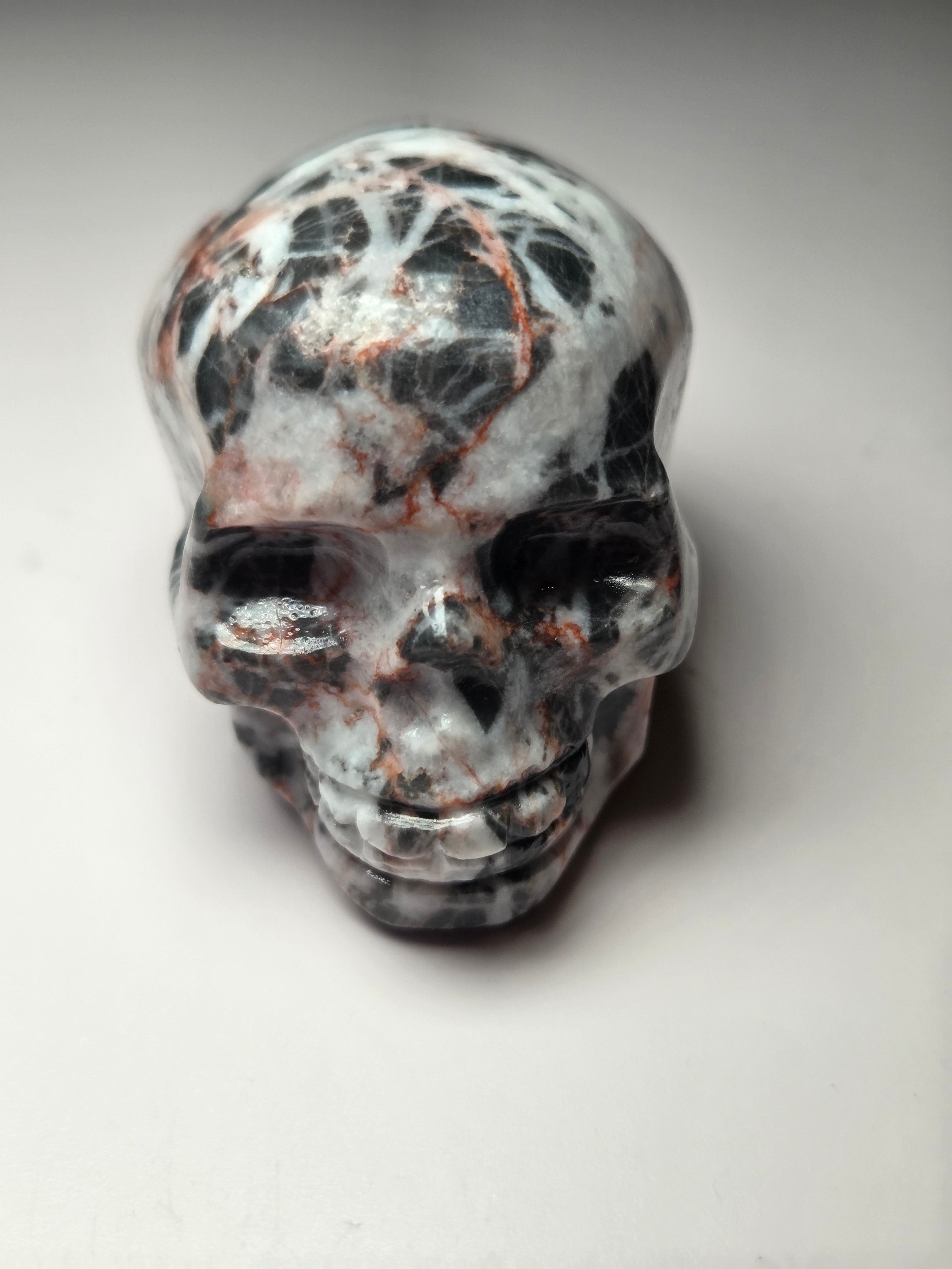 Red vain jasper crystal skull