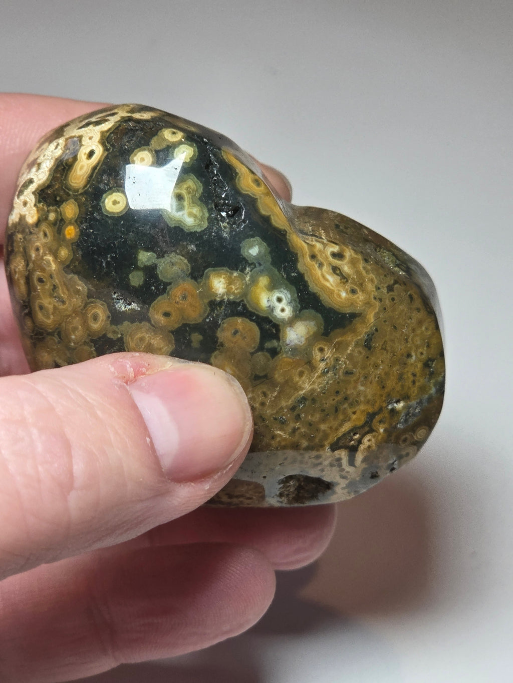 Ocean Jasper crystal heart carving with imperfections