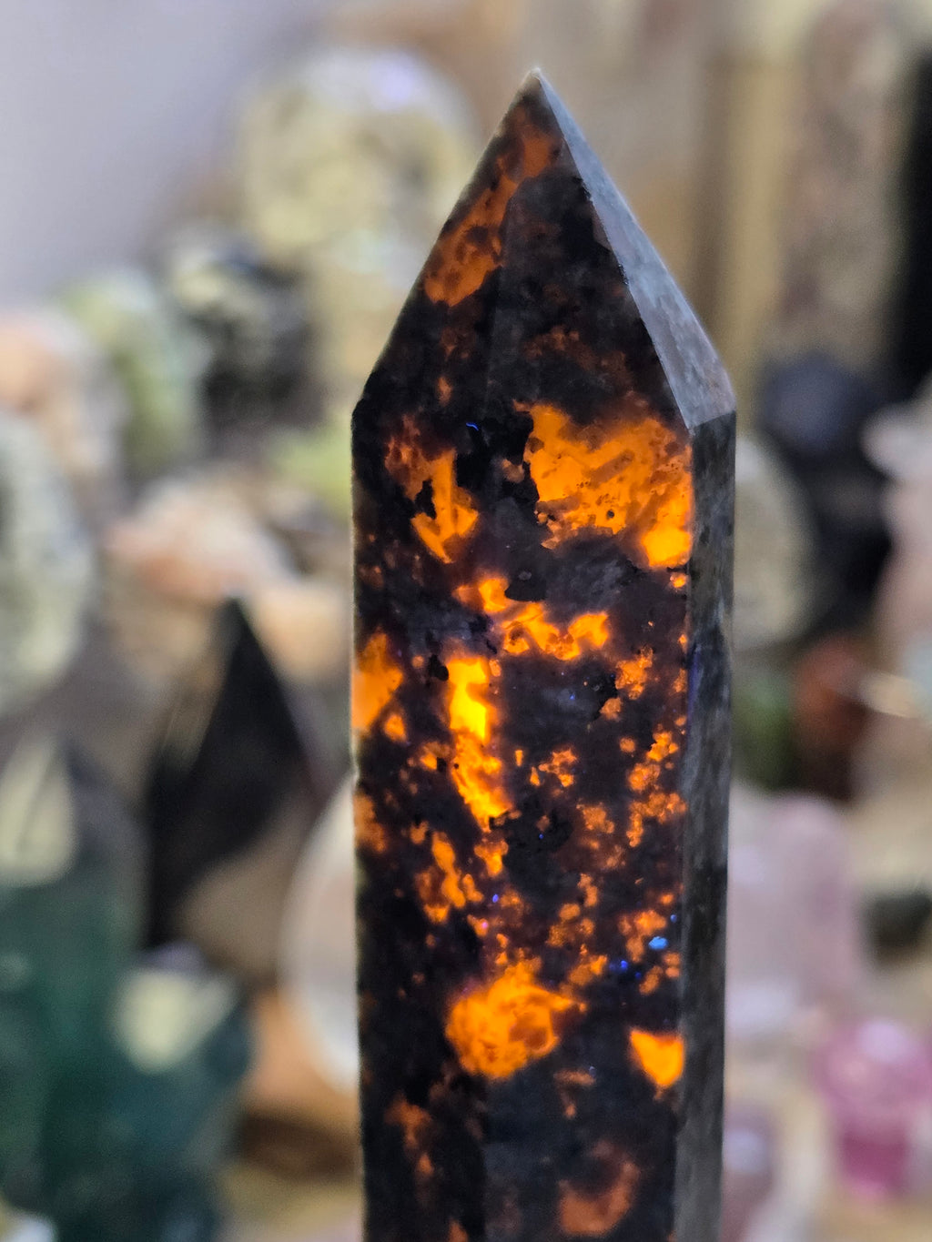 Large Yooperlite crystal tower with orange Uv