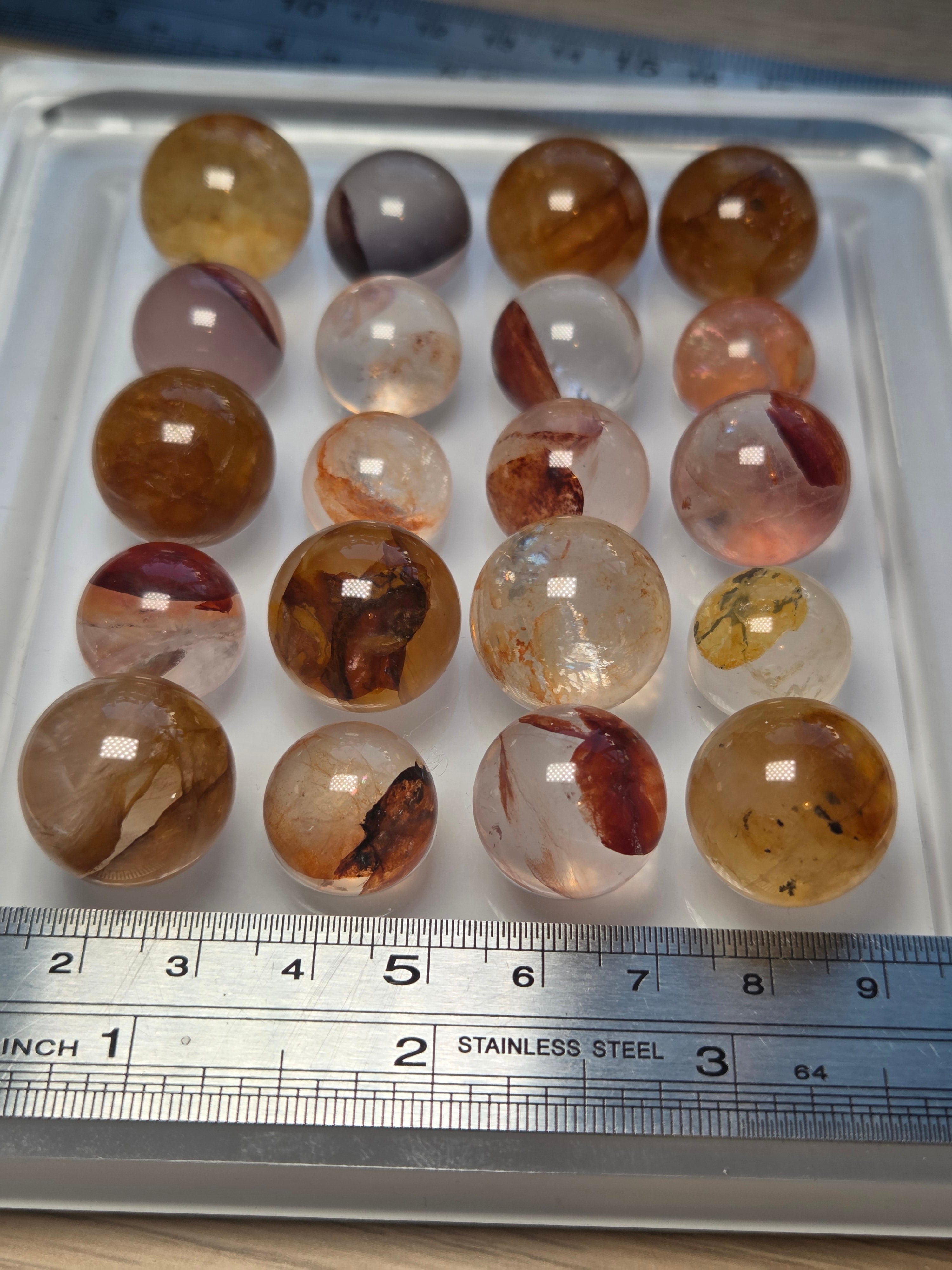 Mini crystal sphere fire quartz and golden healer- with stand