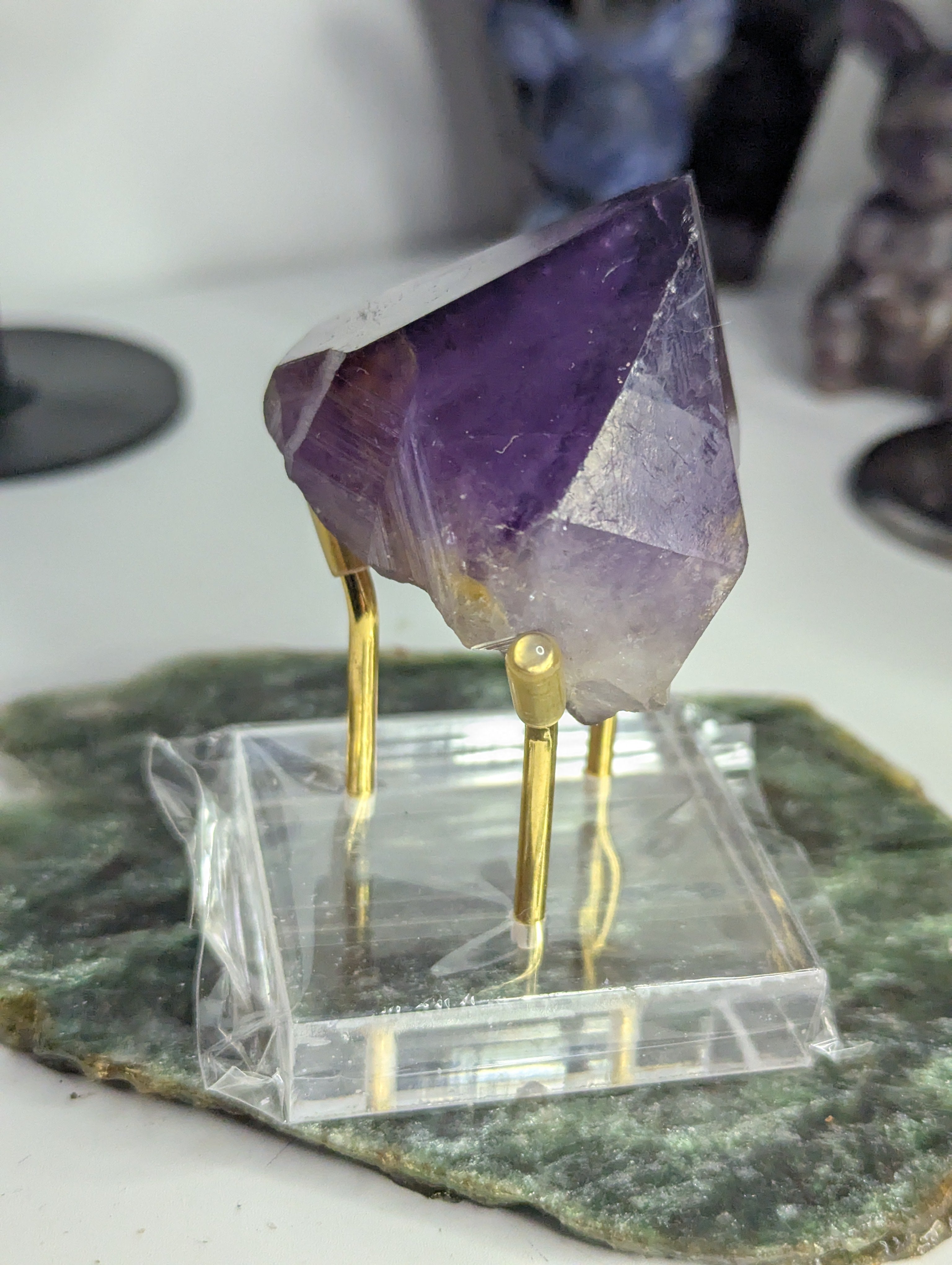 Amethyst crystal tooth from Brazil with stand