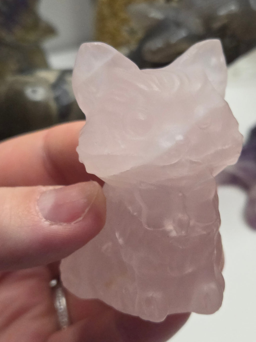 Rose quartz crystal cat carving