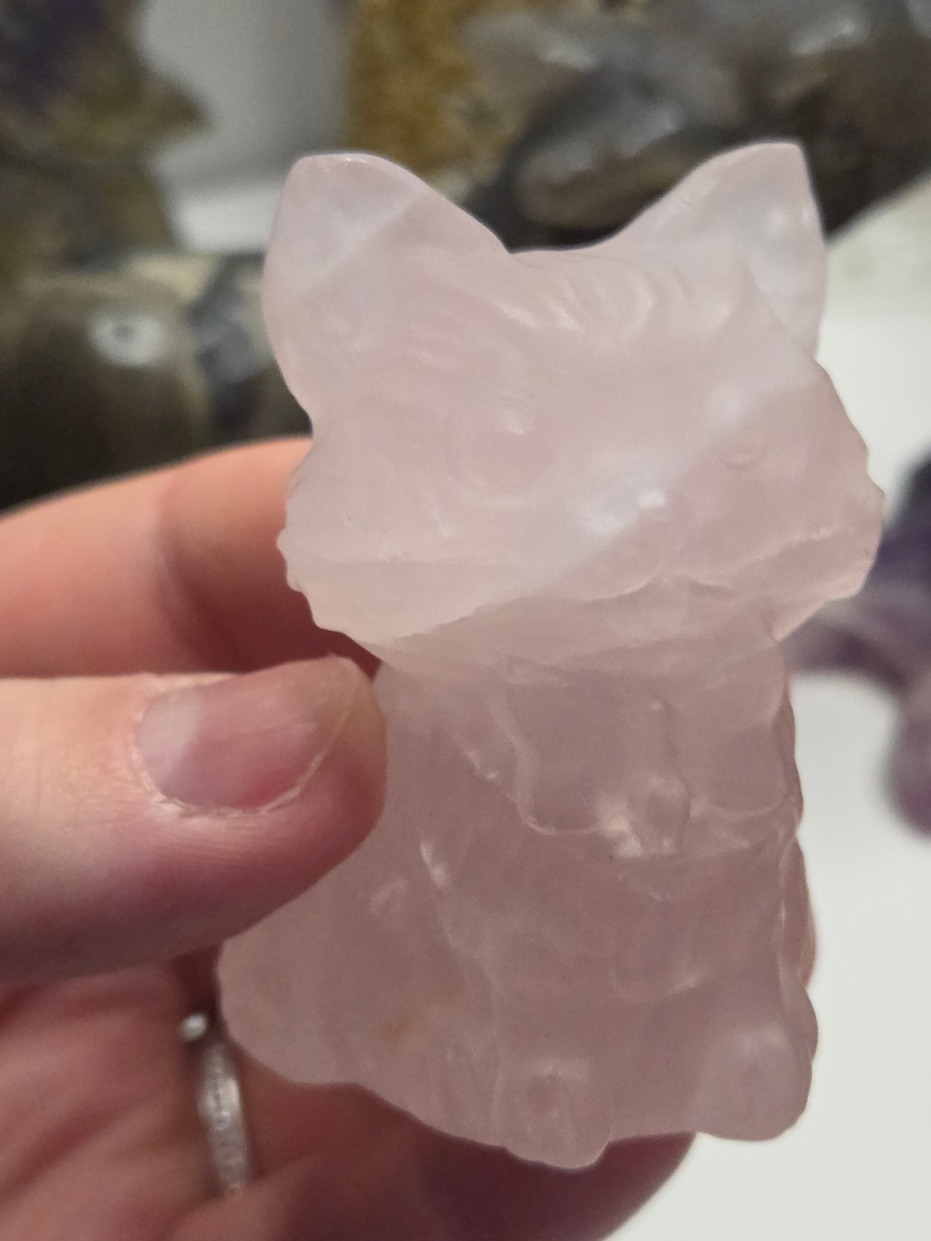 Rose quartz crystal cat carving