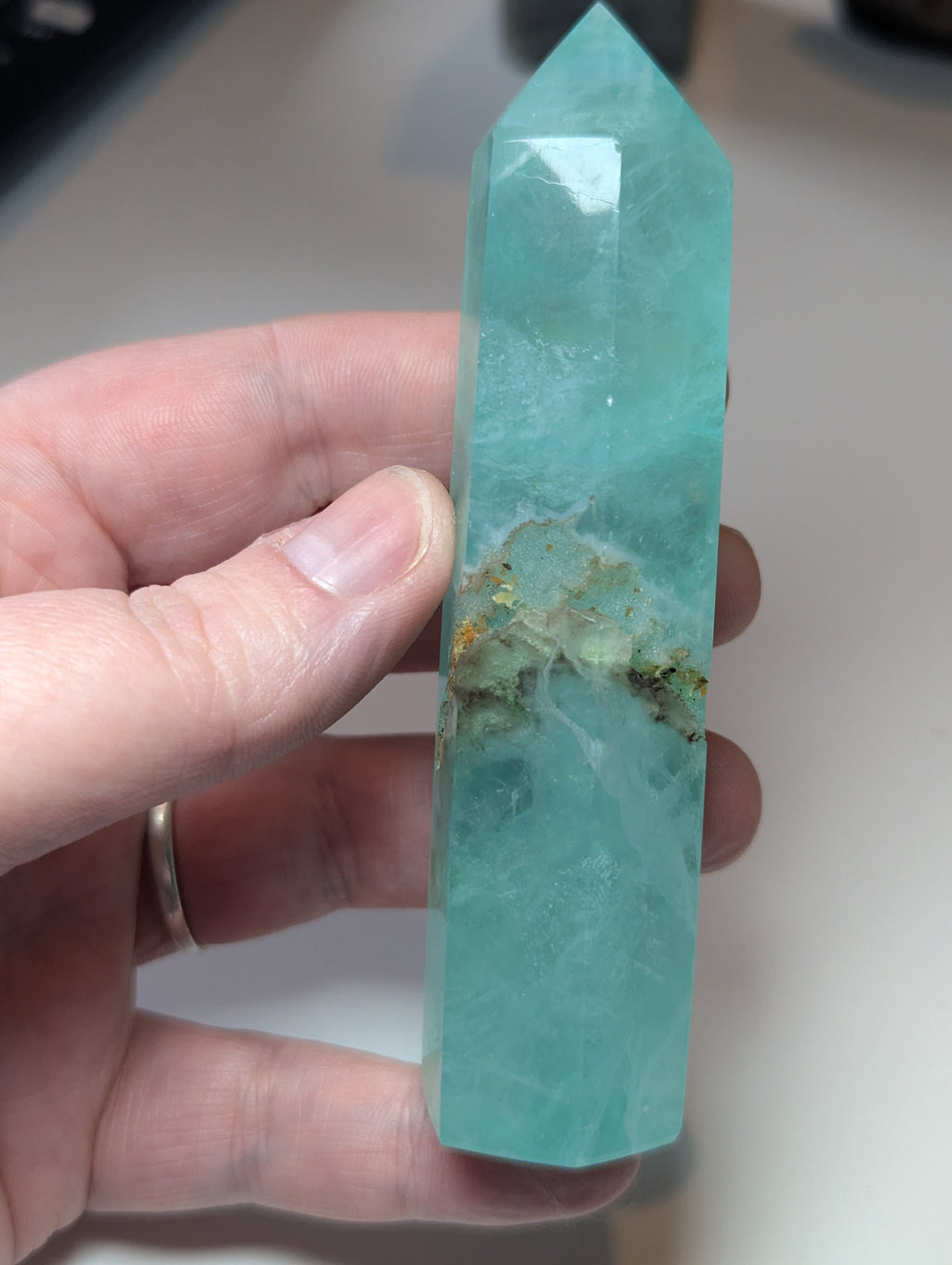 Green flouite crystal tower with imperfections
