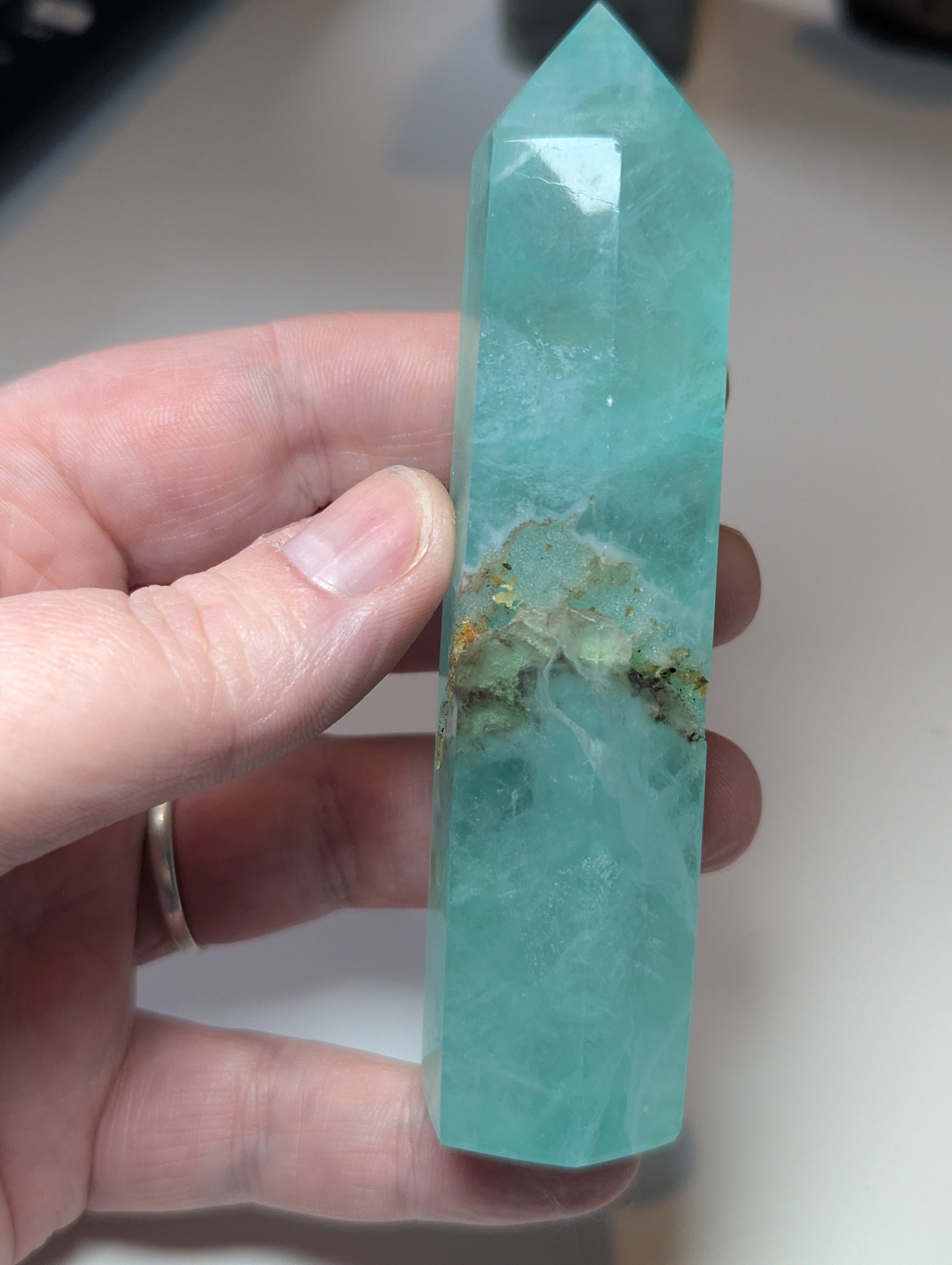 Green flouite crystal tower with imperfections