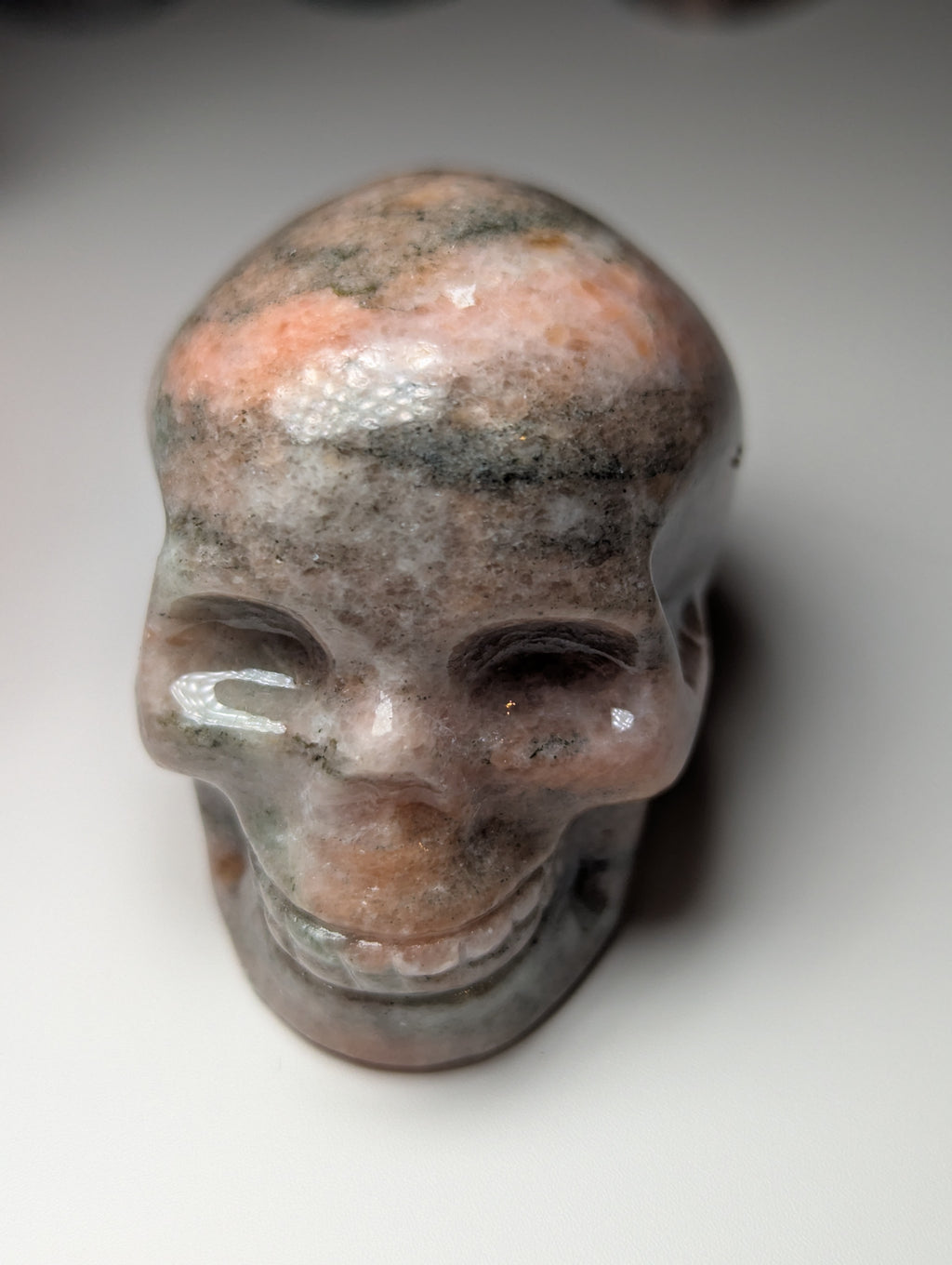 Sunstone crystal skull carving