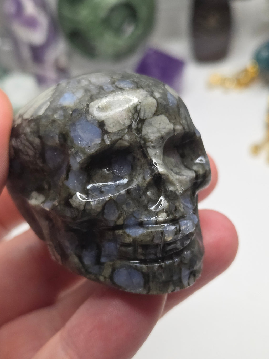 Blue spot crystal skull carving