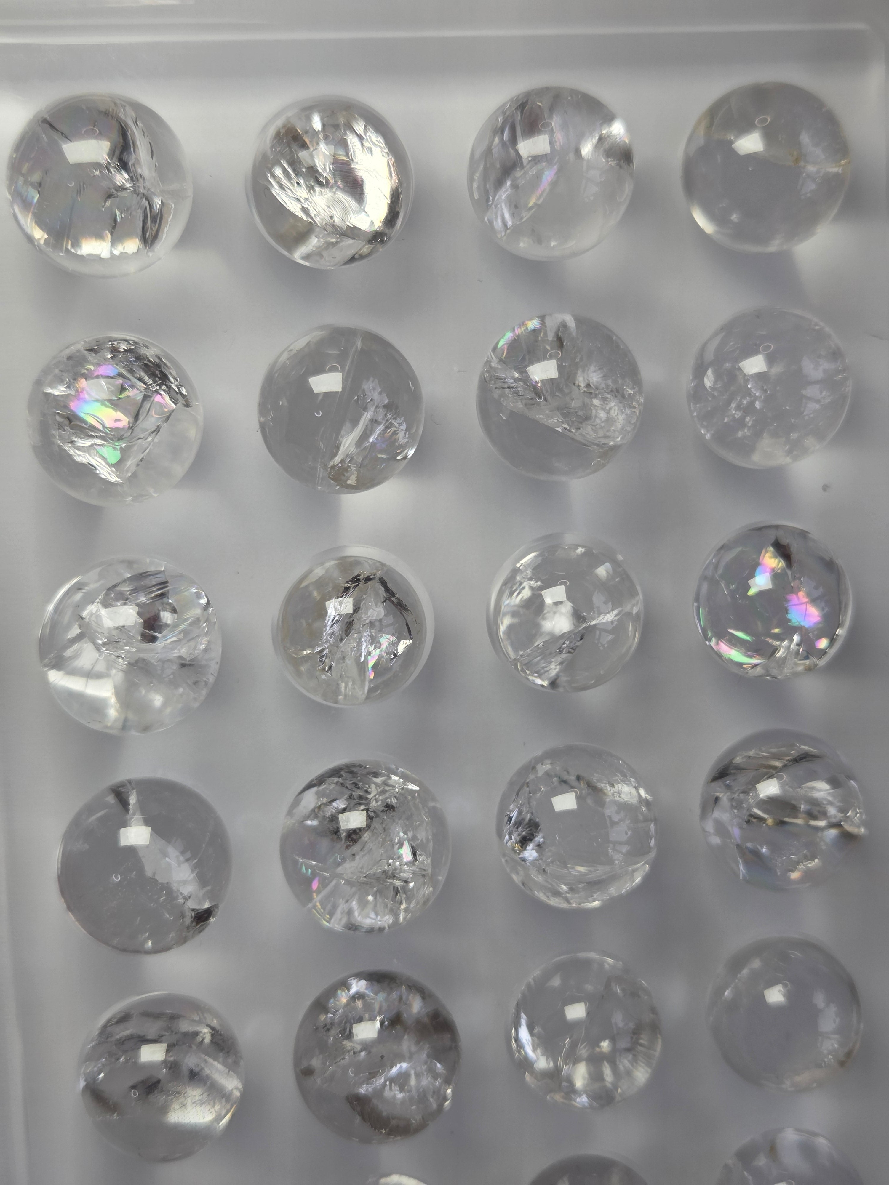 Rainbow clear quartz crystal sphere