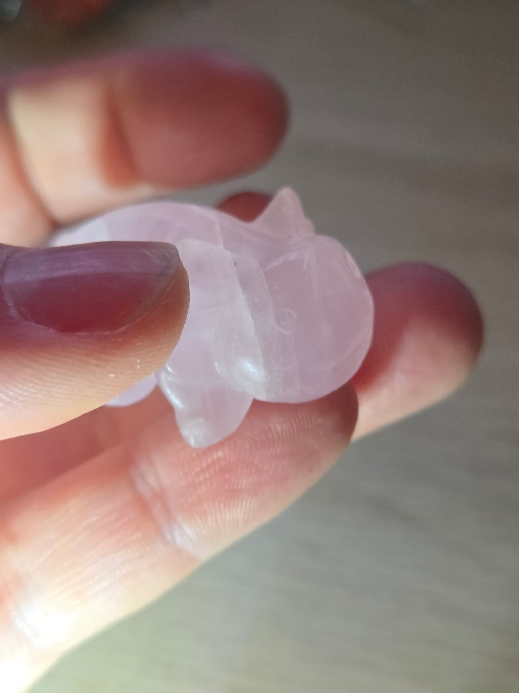Rose quartz crystal axolotl carving
