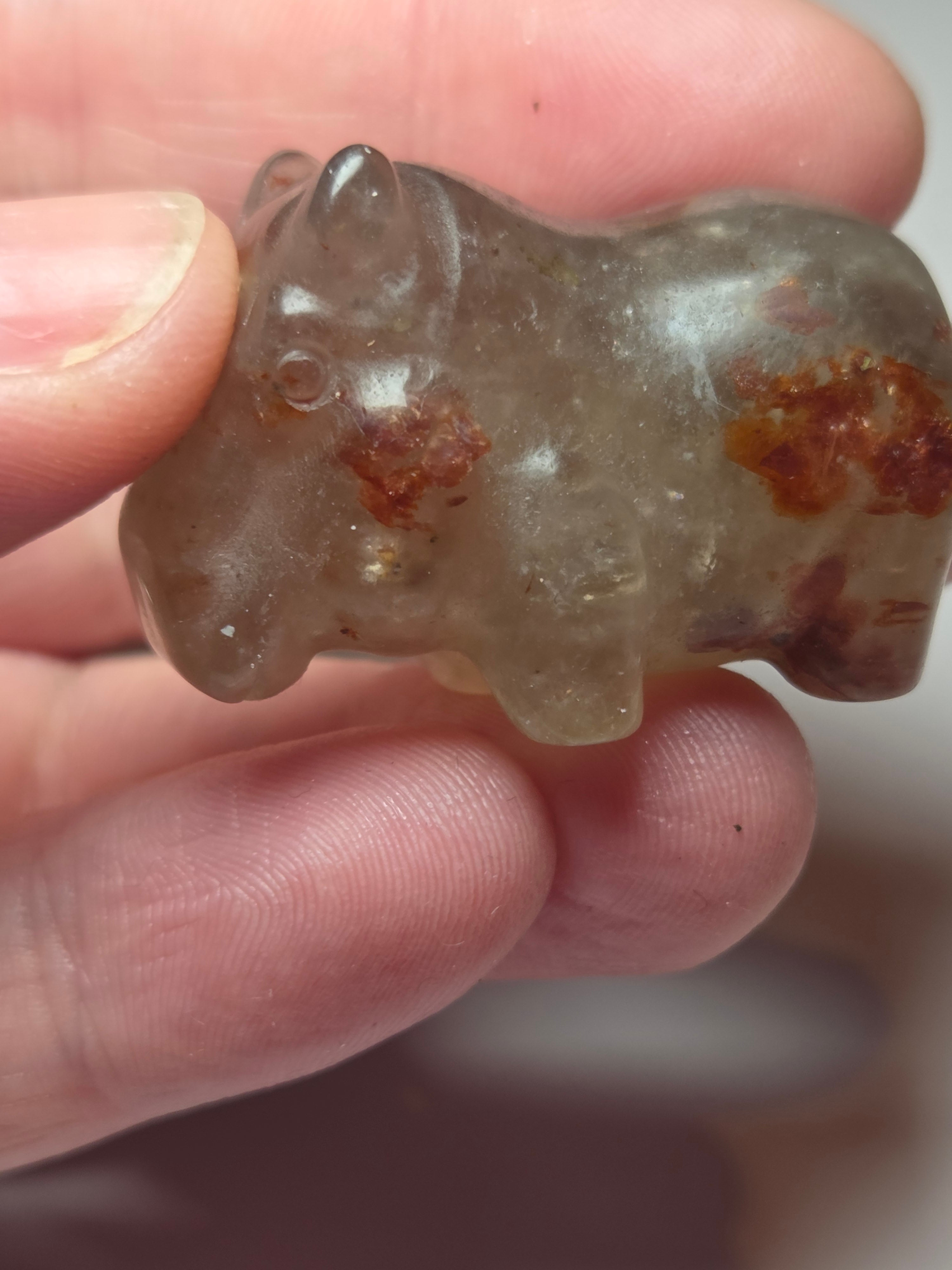 Fire quartz crystal hippo carving