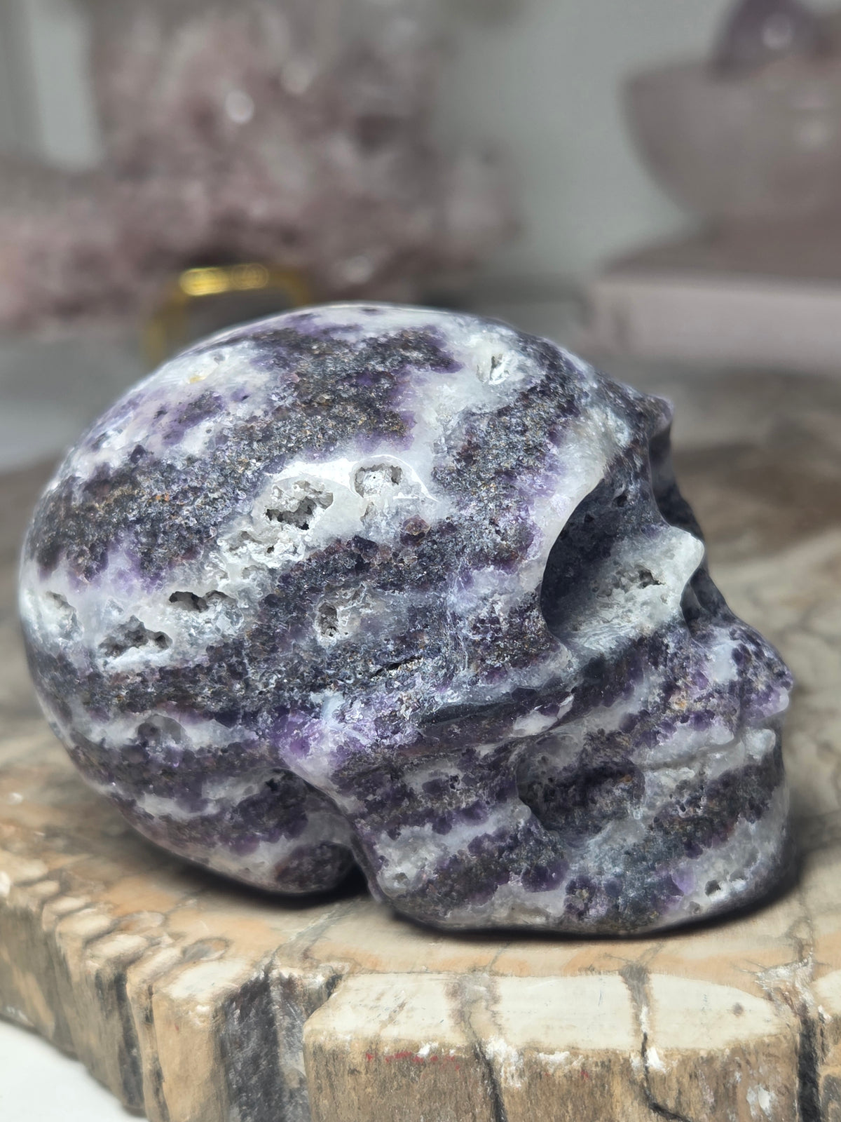 Purple zebra jasper crystal skull carving