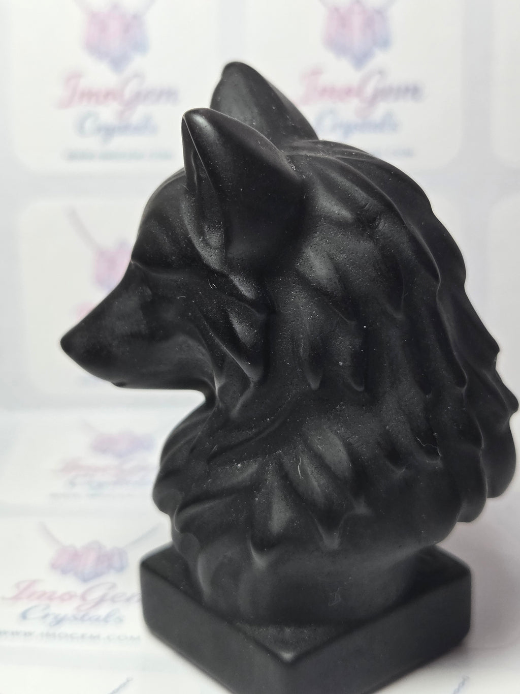 Obsidian crystal wolf head carving