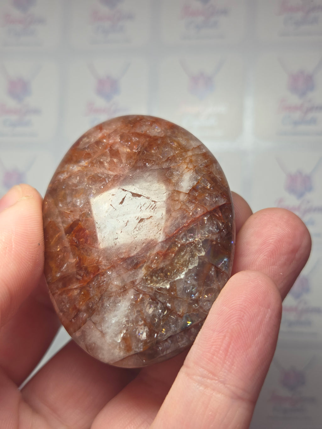 Fire quartz crystal palm stone