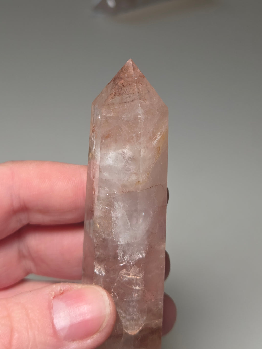Fire quartz crystal tower with imperfections