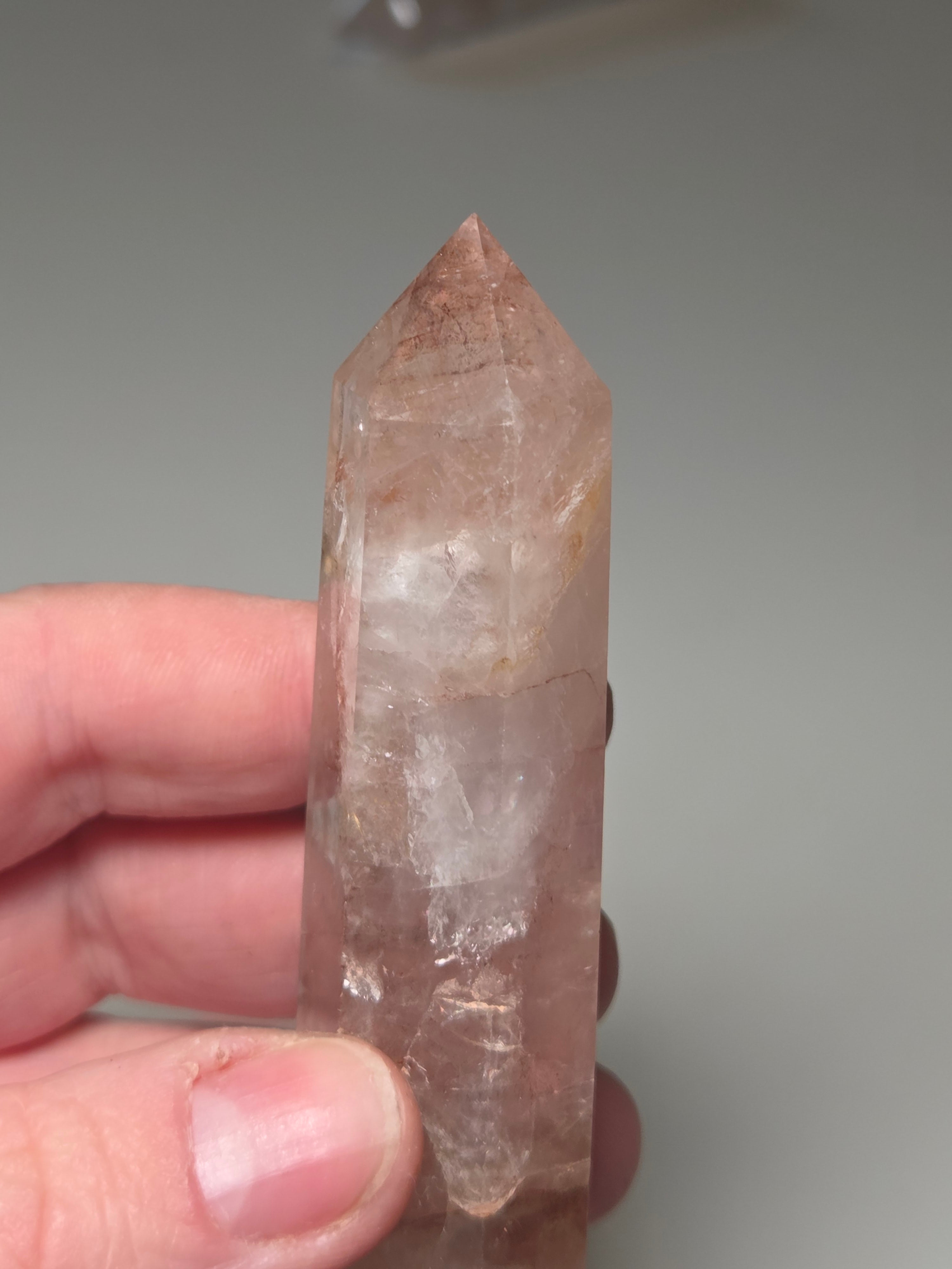 Fire quartz crystal tower with imperfections