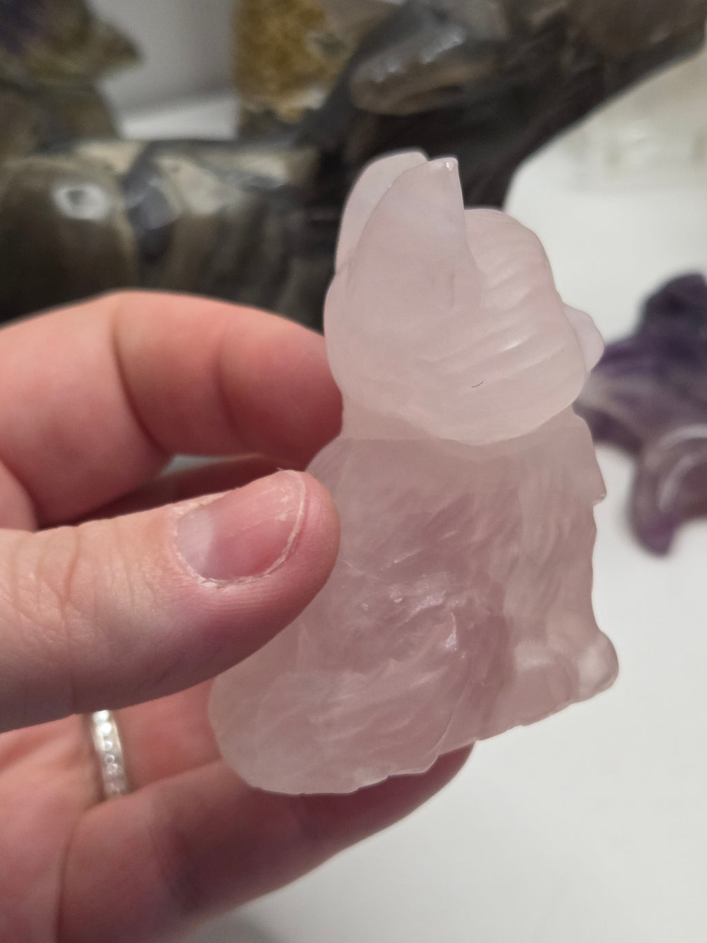 Rose quartz crystal cat carving