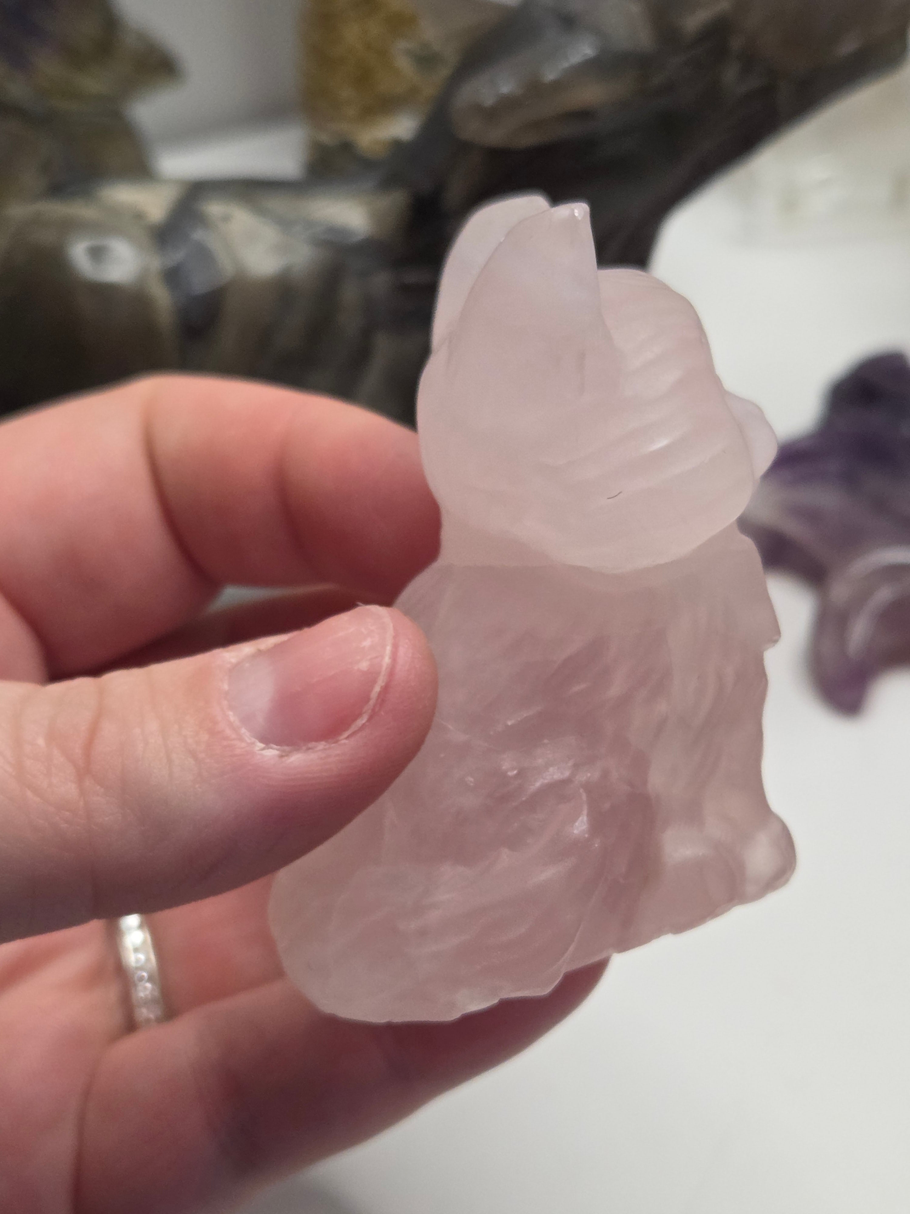 Rose quartz crystal cat carving