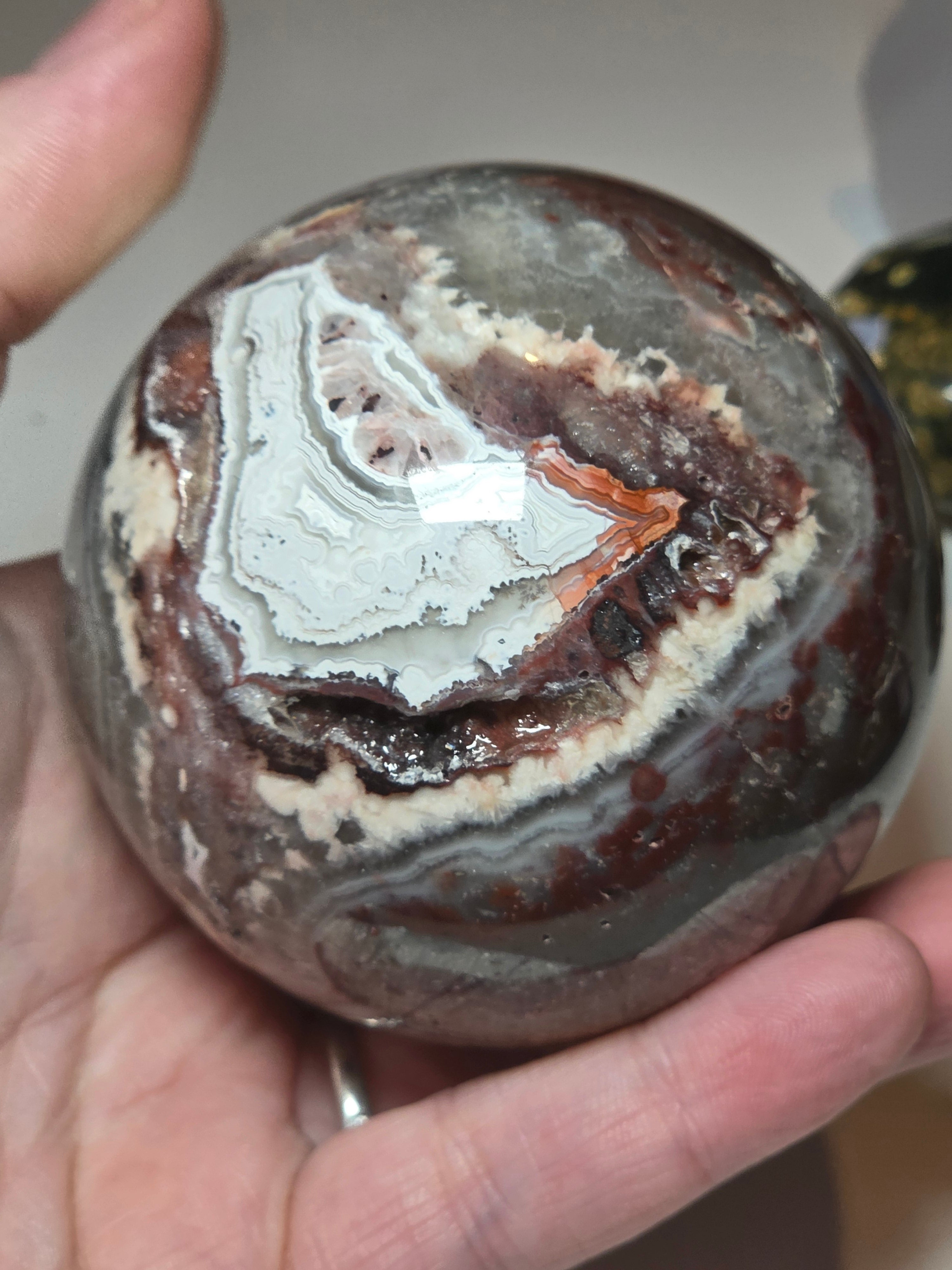 Mexican crazy lace agate crystal sphere  with imperfections
