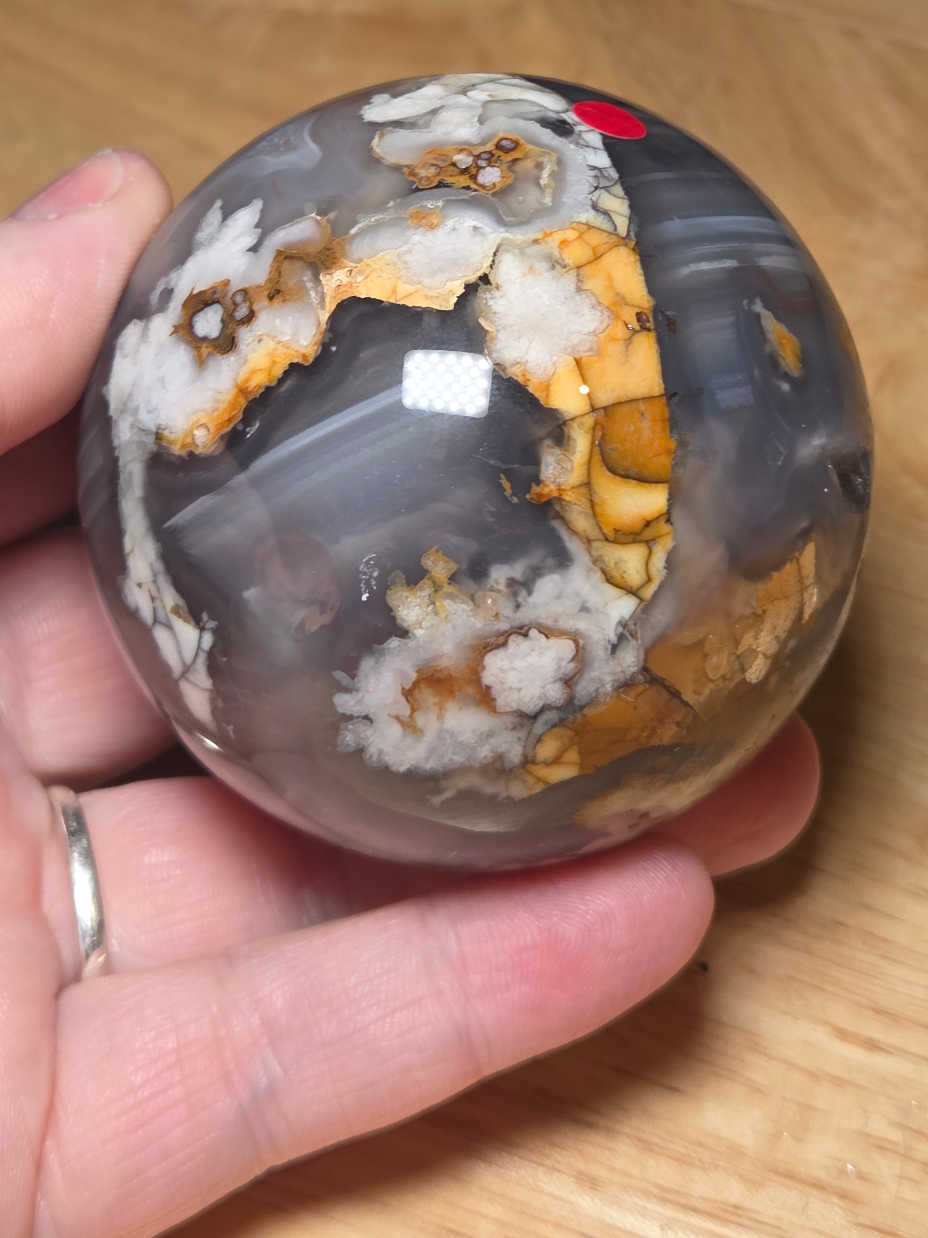 Natural black flower agate crystal sphere