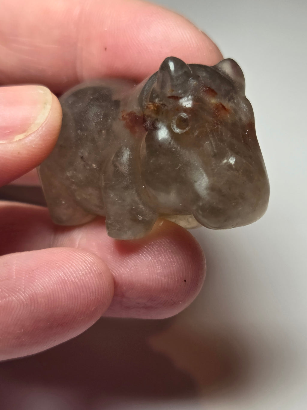 Fire quartz crystal hippo carving