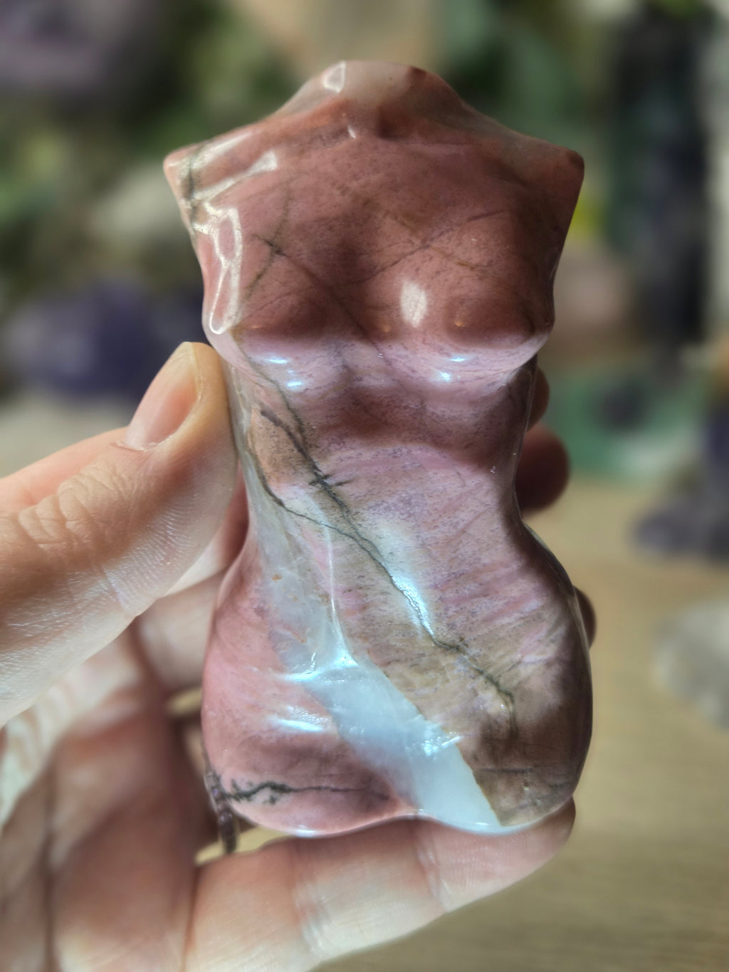 Rhodonite crystal female body carving