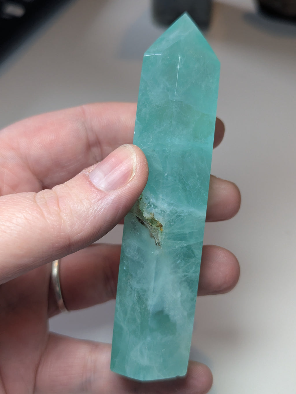 Green flouite crystal tower with imperfections