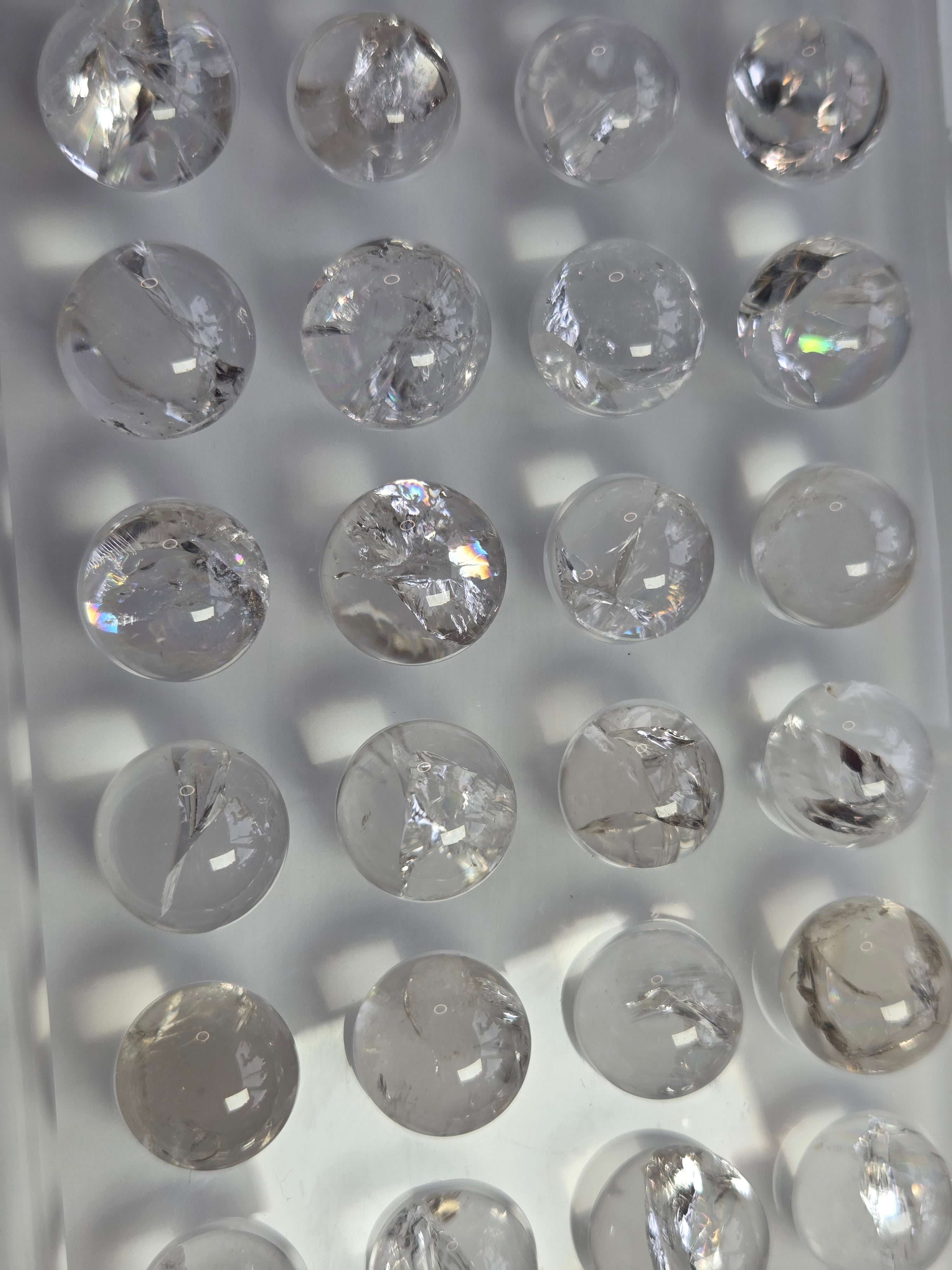 Rainbow clear quartz crystal sphere