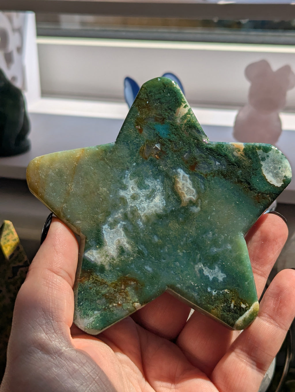 Moss agate crystal star with stand