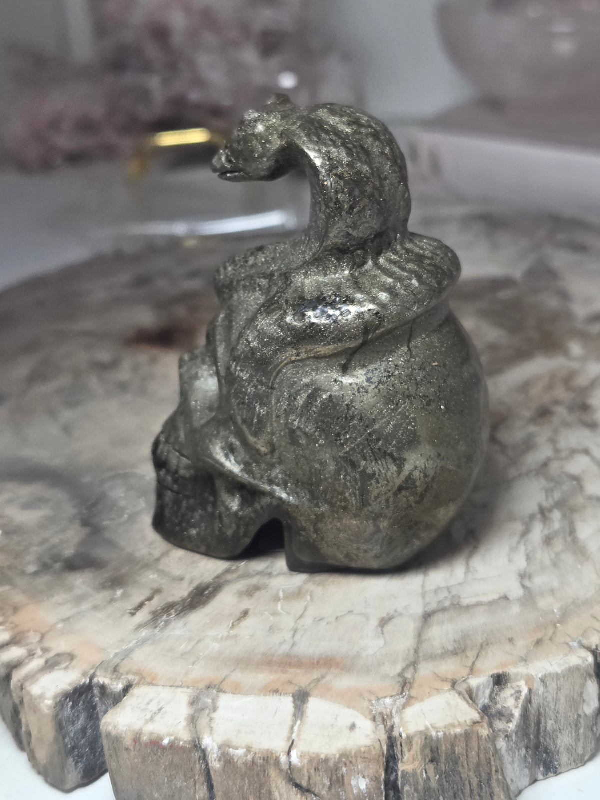 Pyrite crystal skull with Snake carving