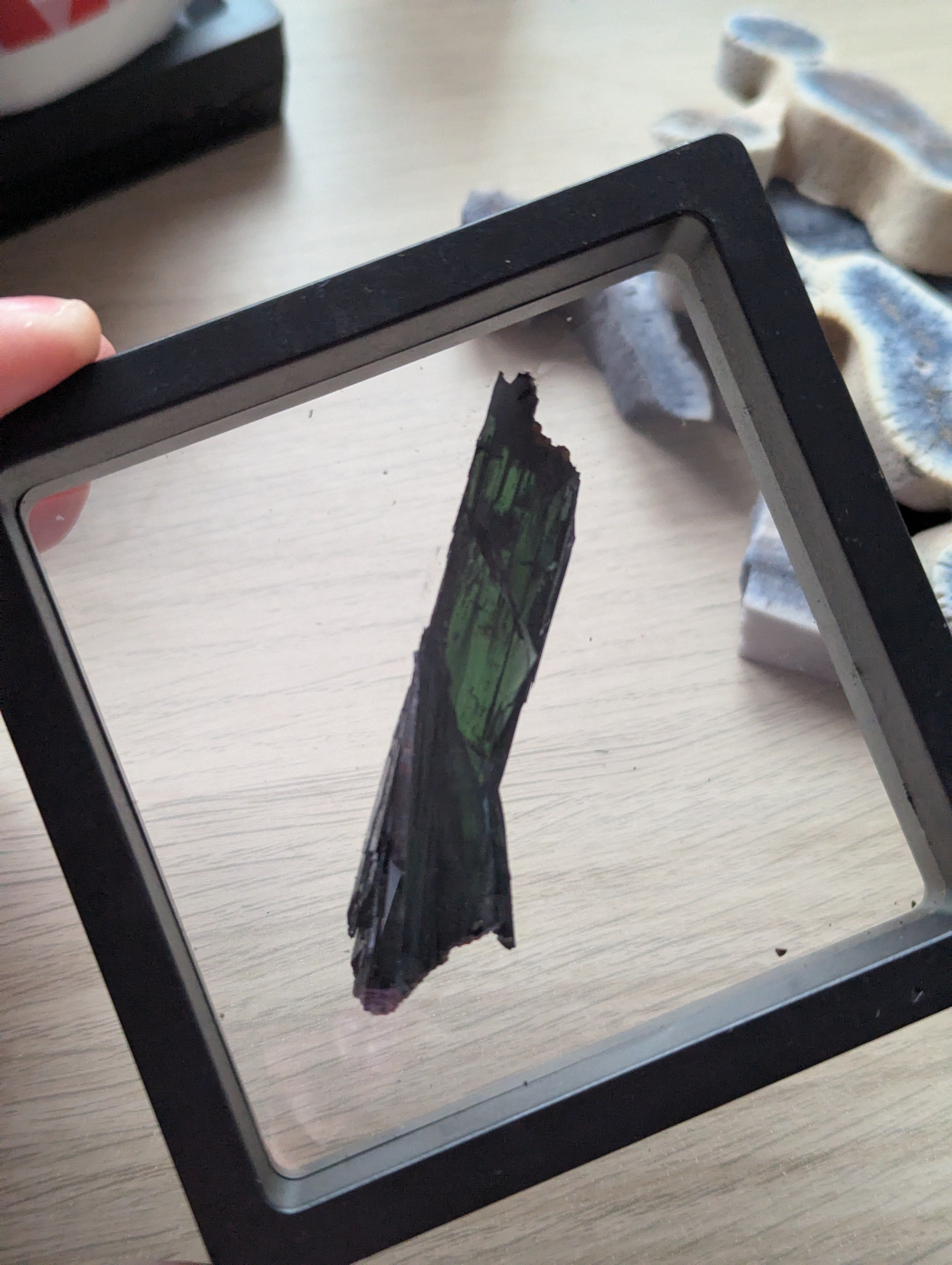 Vivianite specimen in box