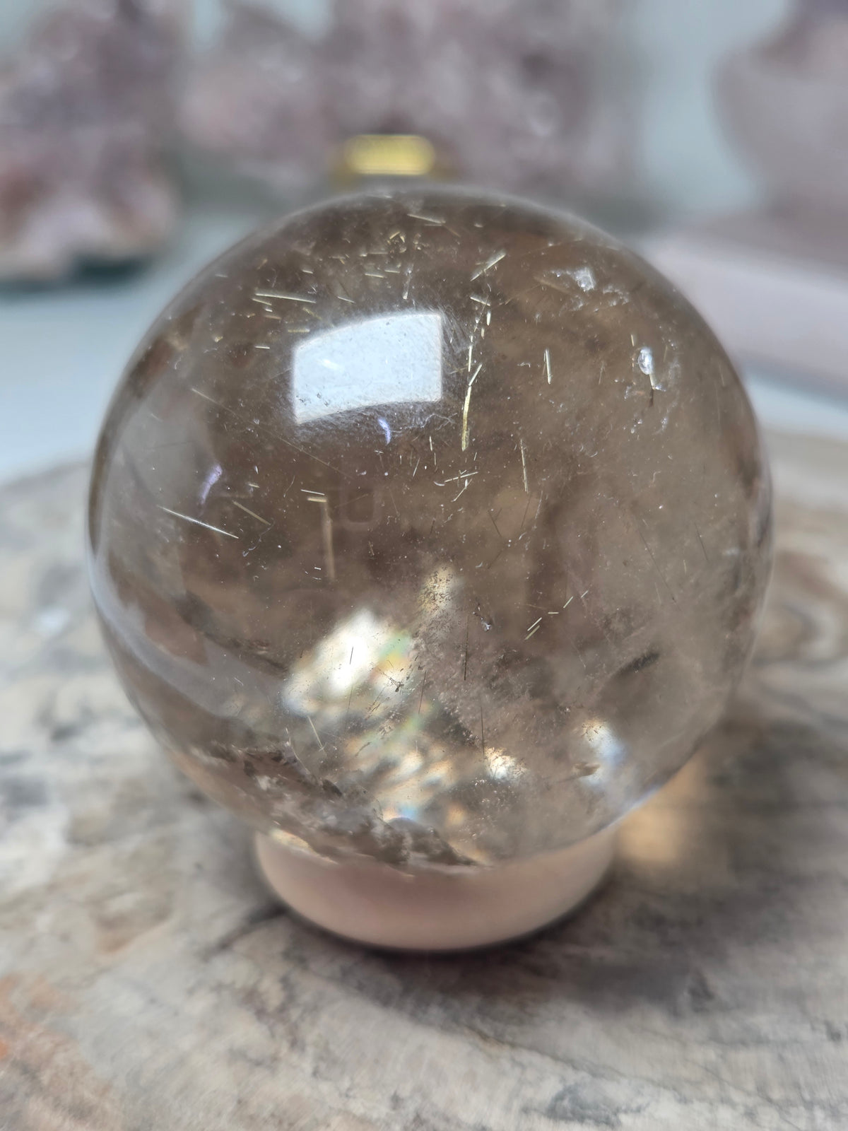 Golden rutile crystal sphere