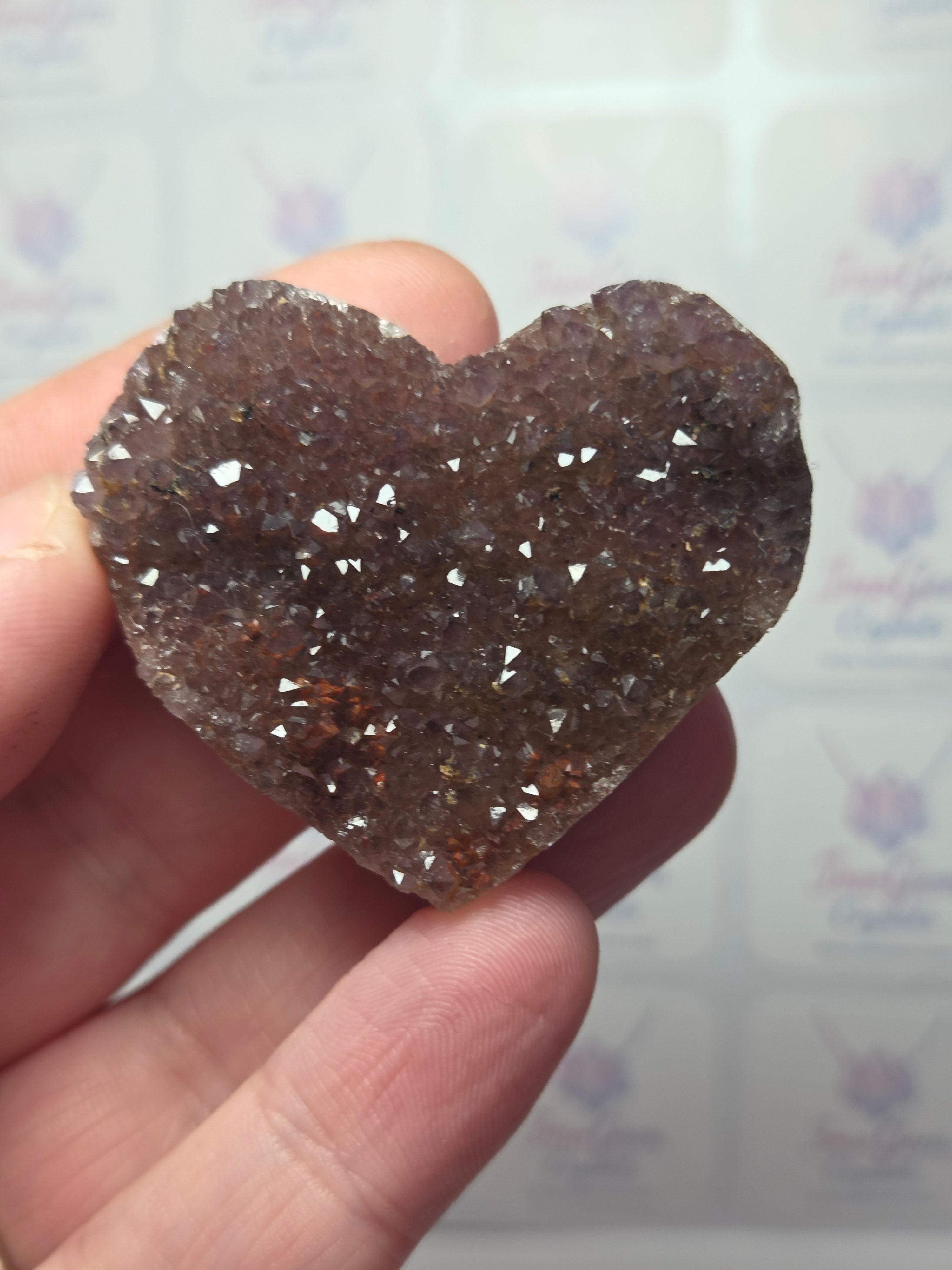 Auralite 23 crystal heart carving