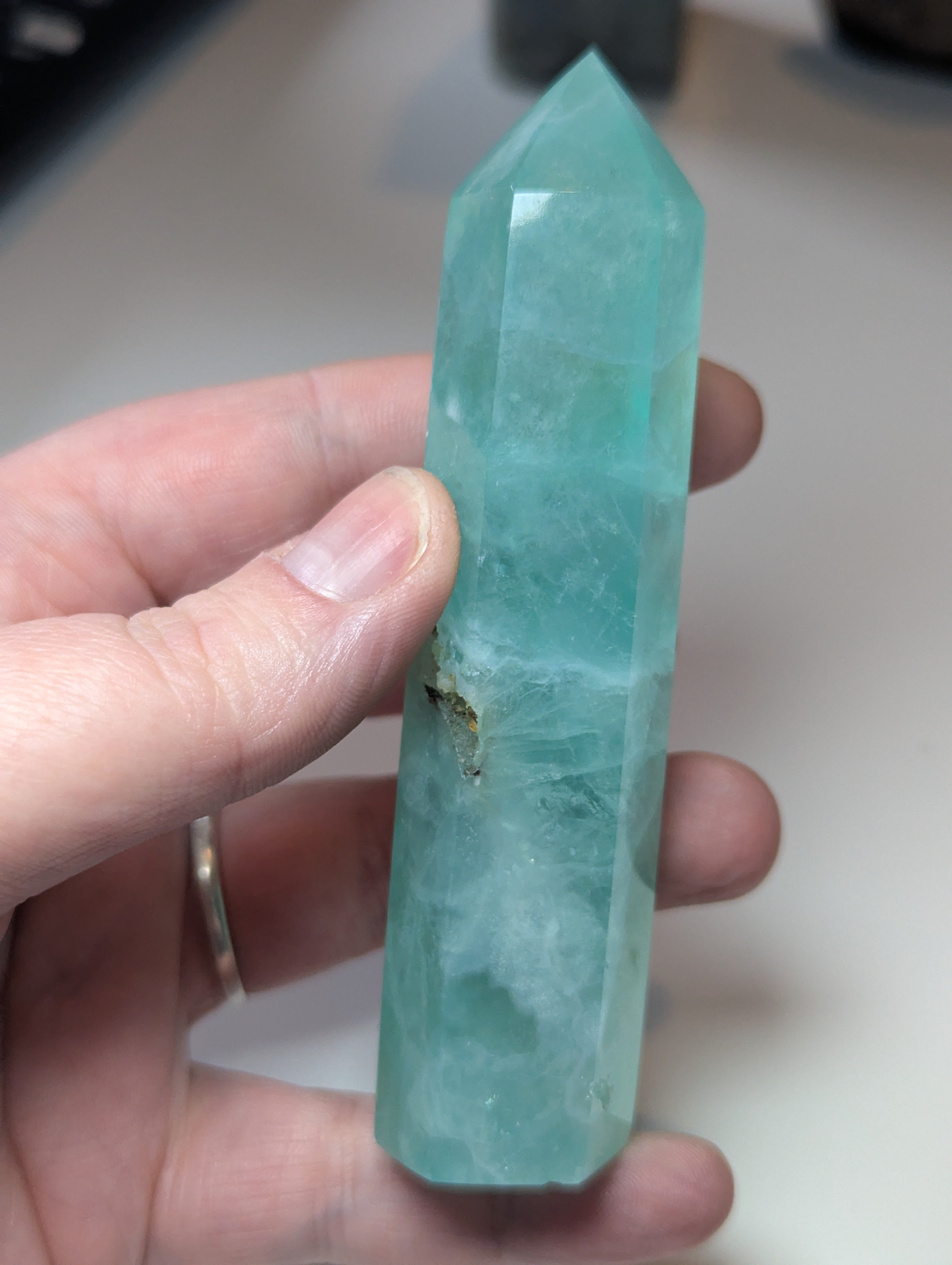 Green flouite crystal tower with imperfections