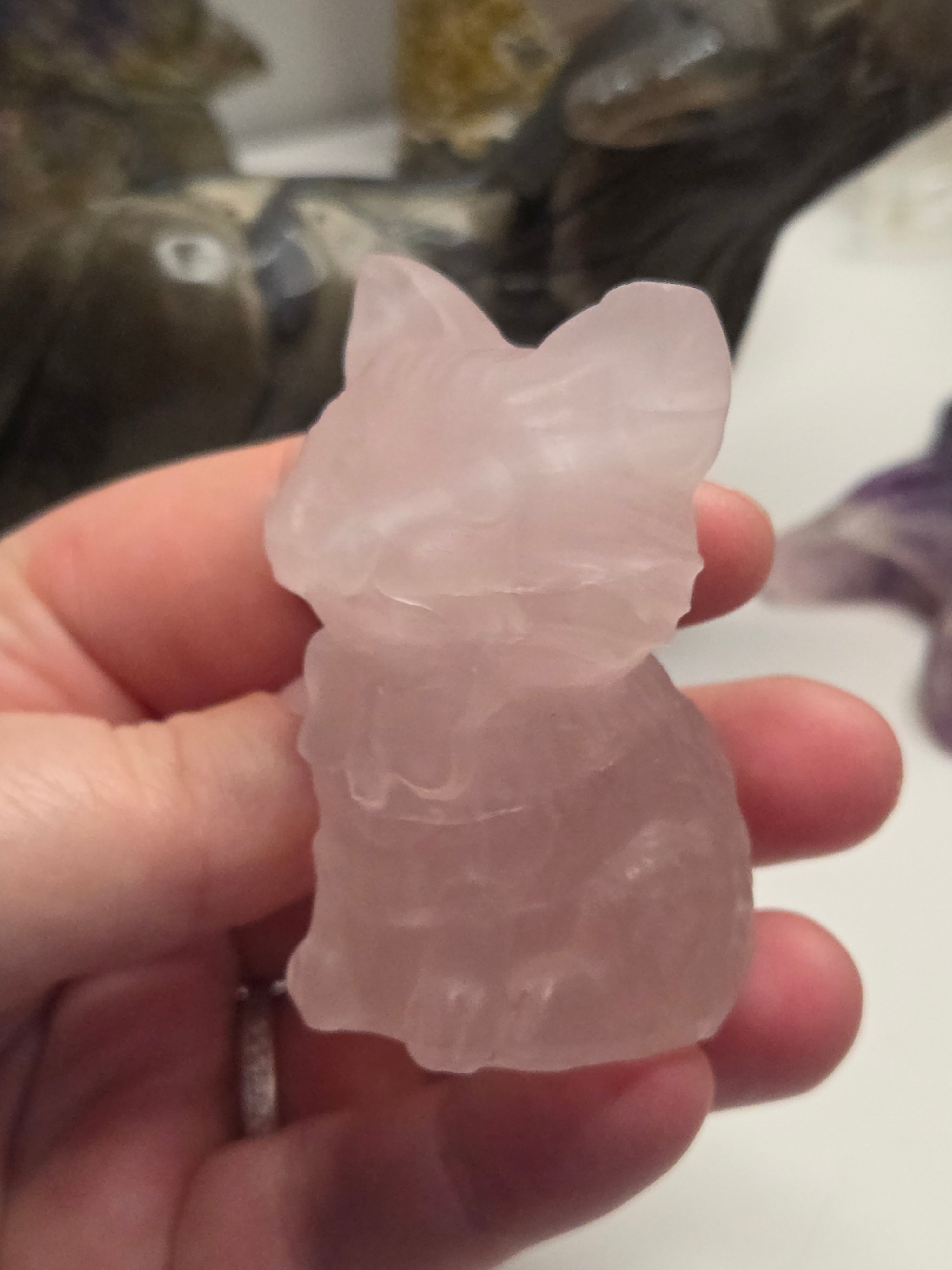 Rose quartz crystal cat carving