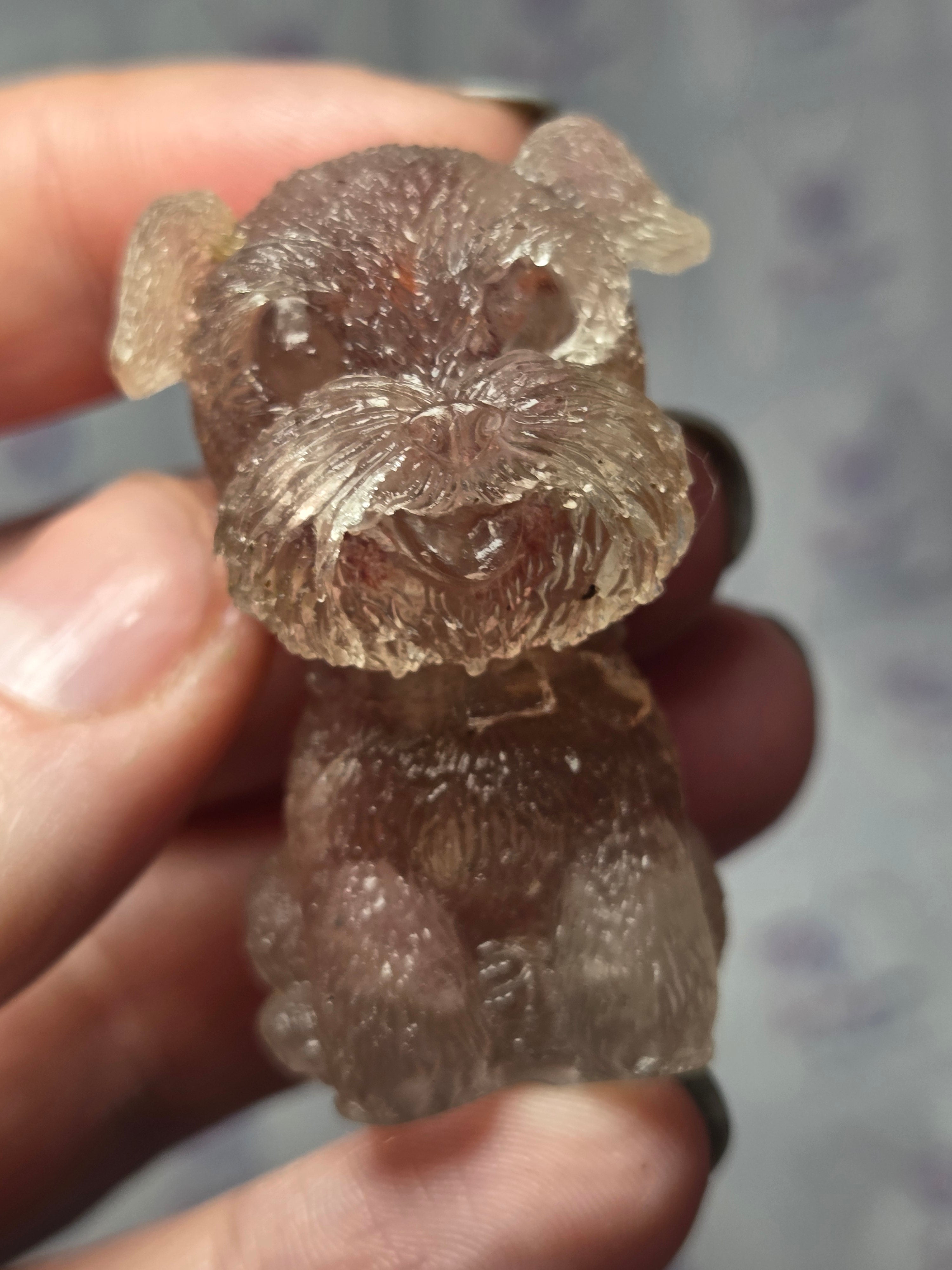Strawberry quartz crystal shnowzer carving in resin