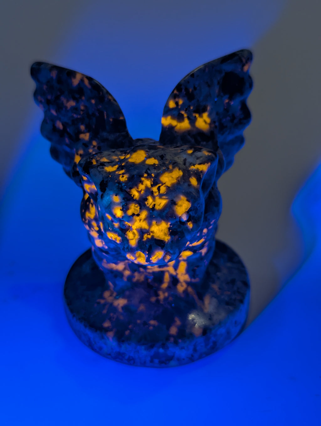 Yooperlite crystal Gargoyle carving orange UV