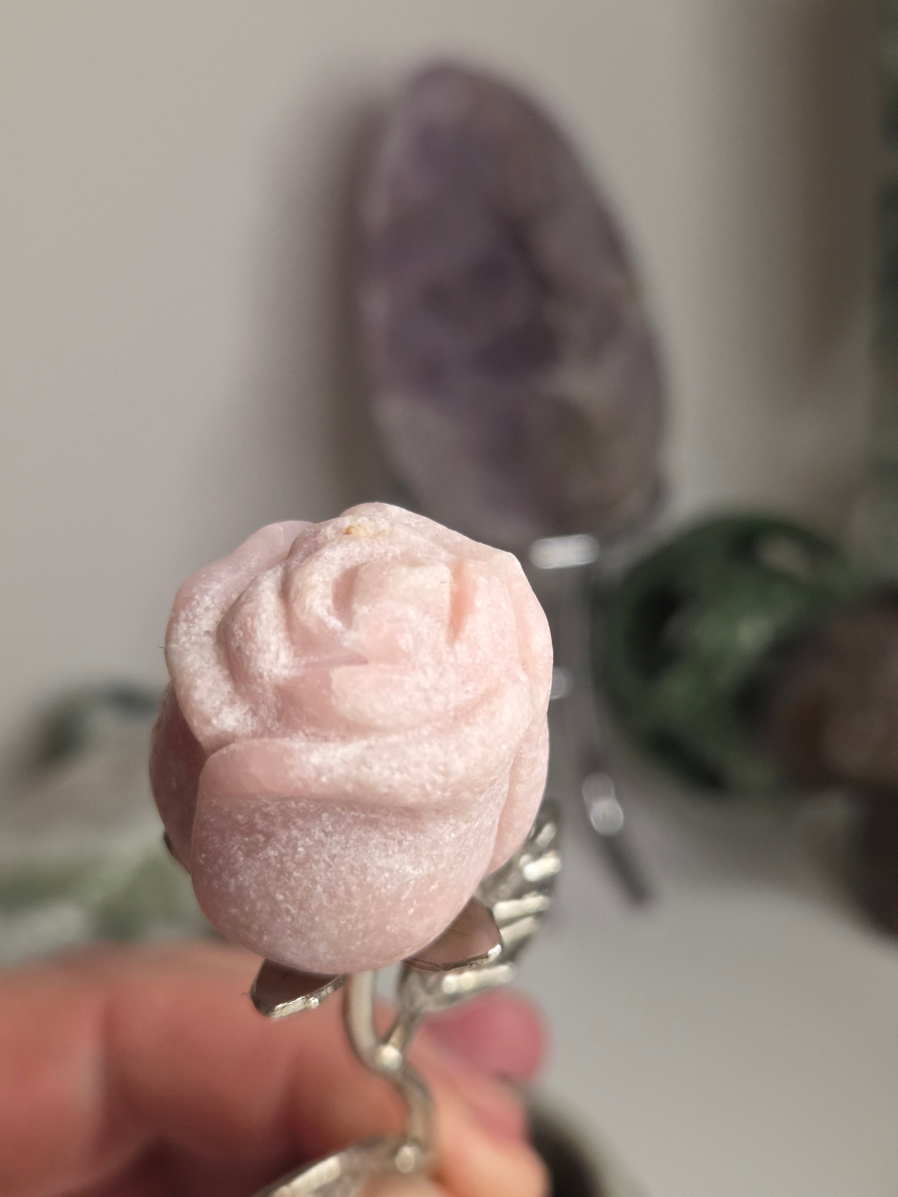 Pink opal crystal rose on stand