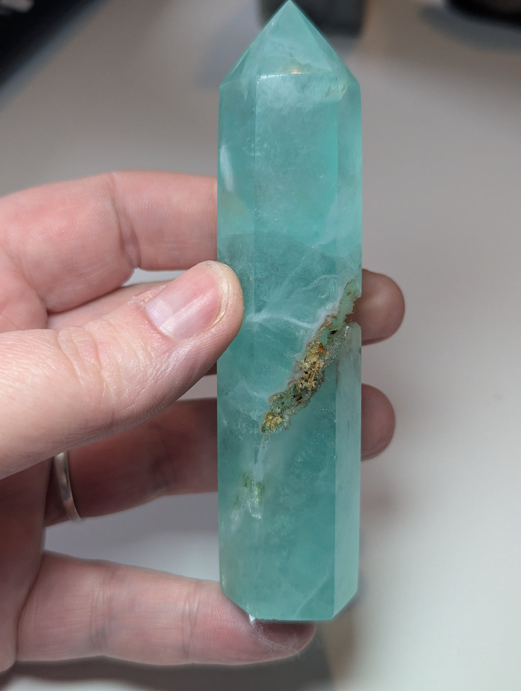 Green flouite crystal tower with imperfections