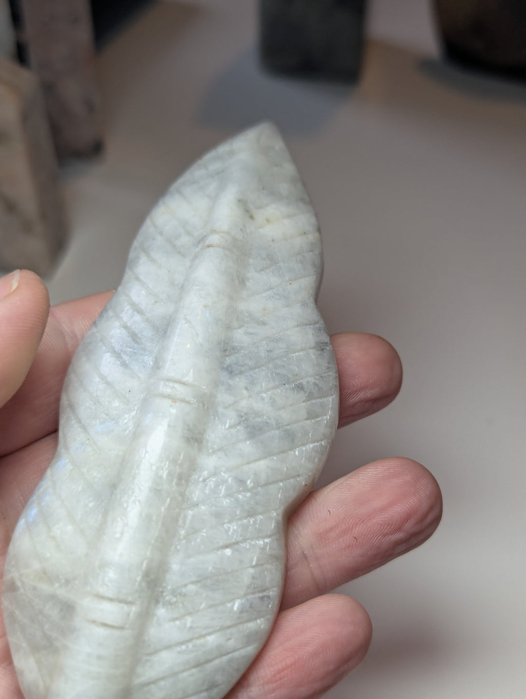 Rainbow moonstone crystal feather carving
