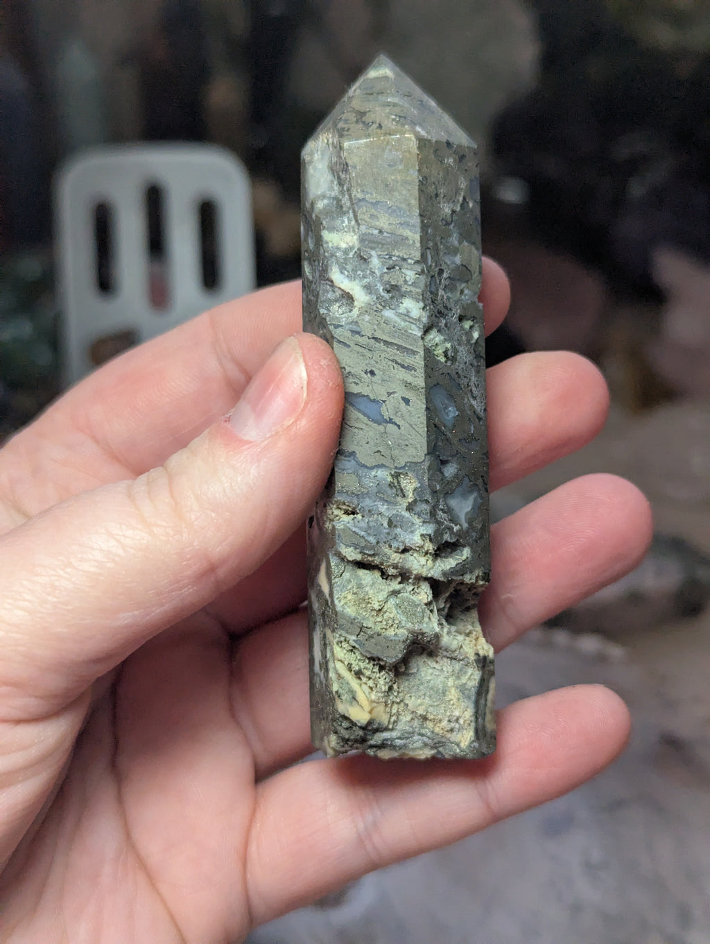 Pyrite crystal tower with agate and has opened natural caves