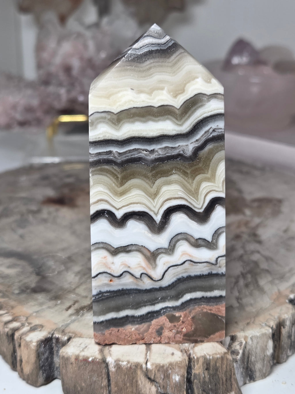 Orange calcite crystal tower