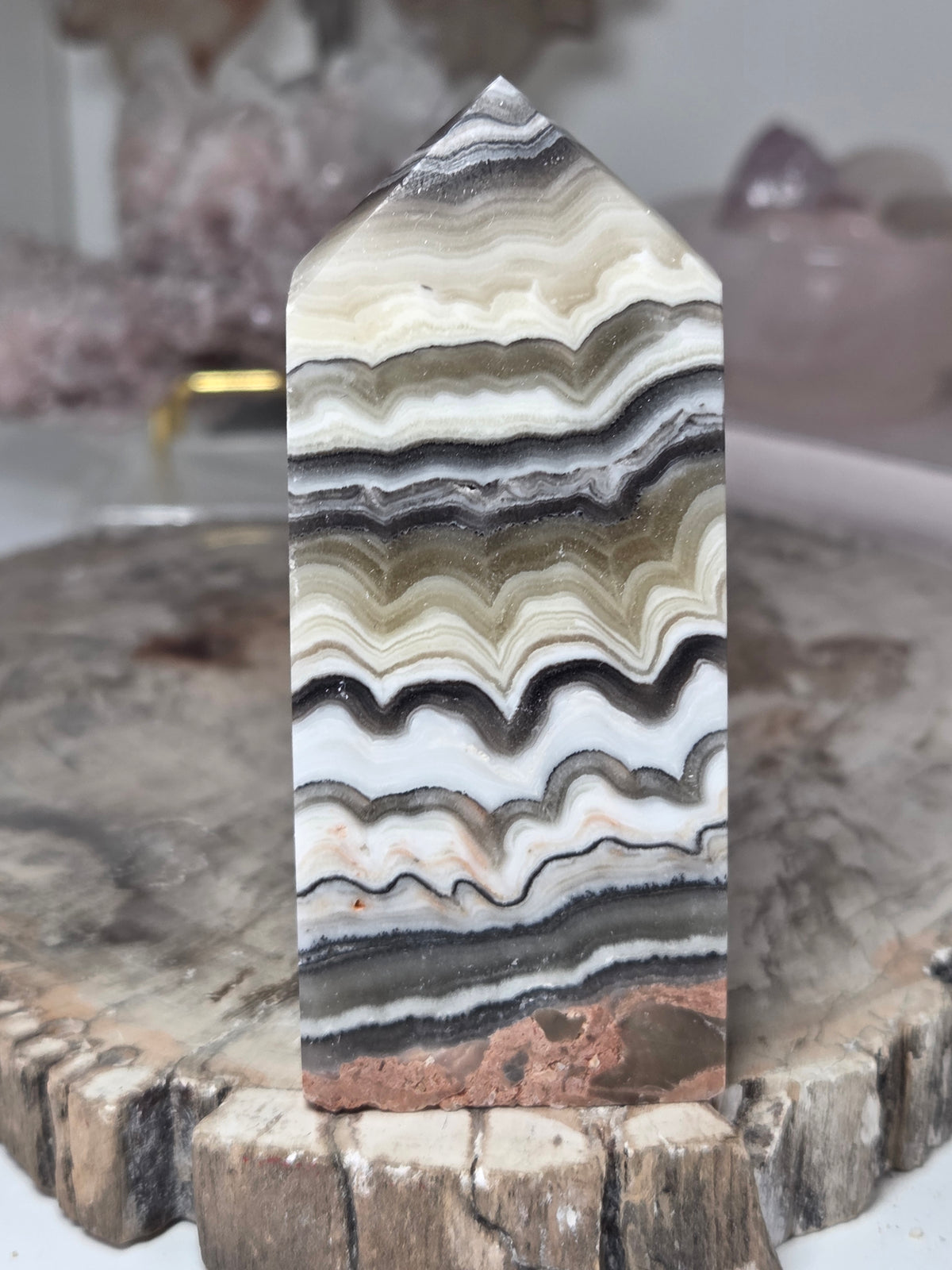 Orange calcite crystal tower