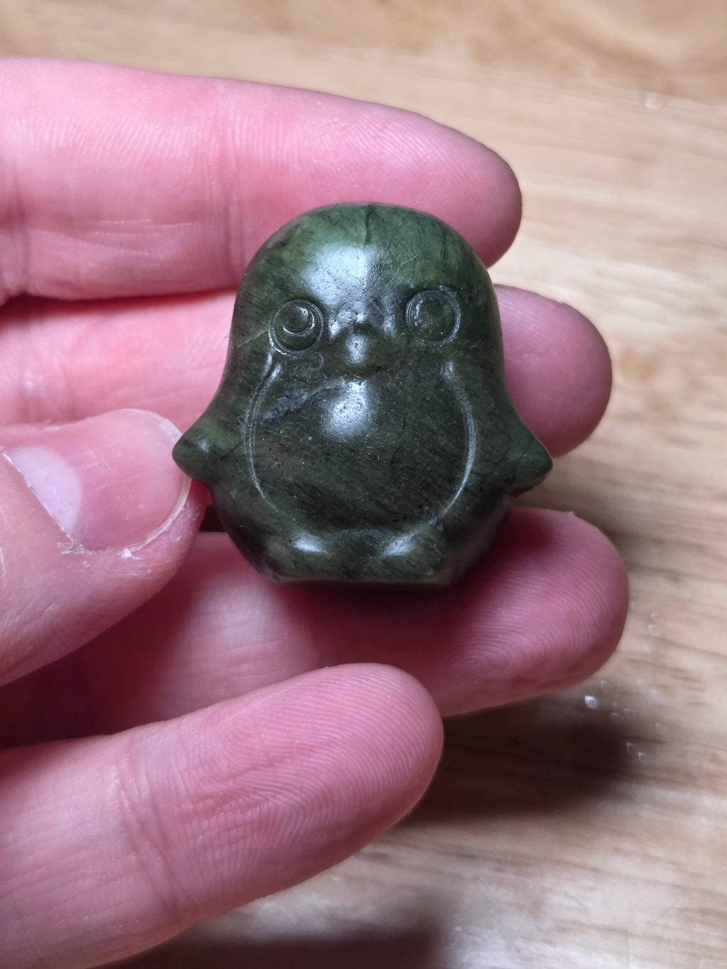 Green jade penguin carving