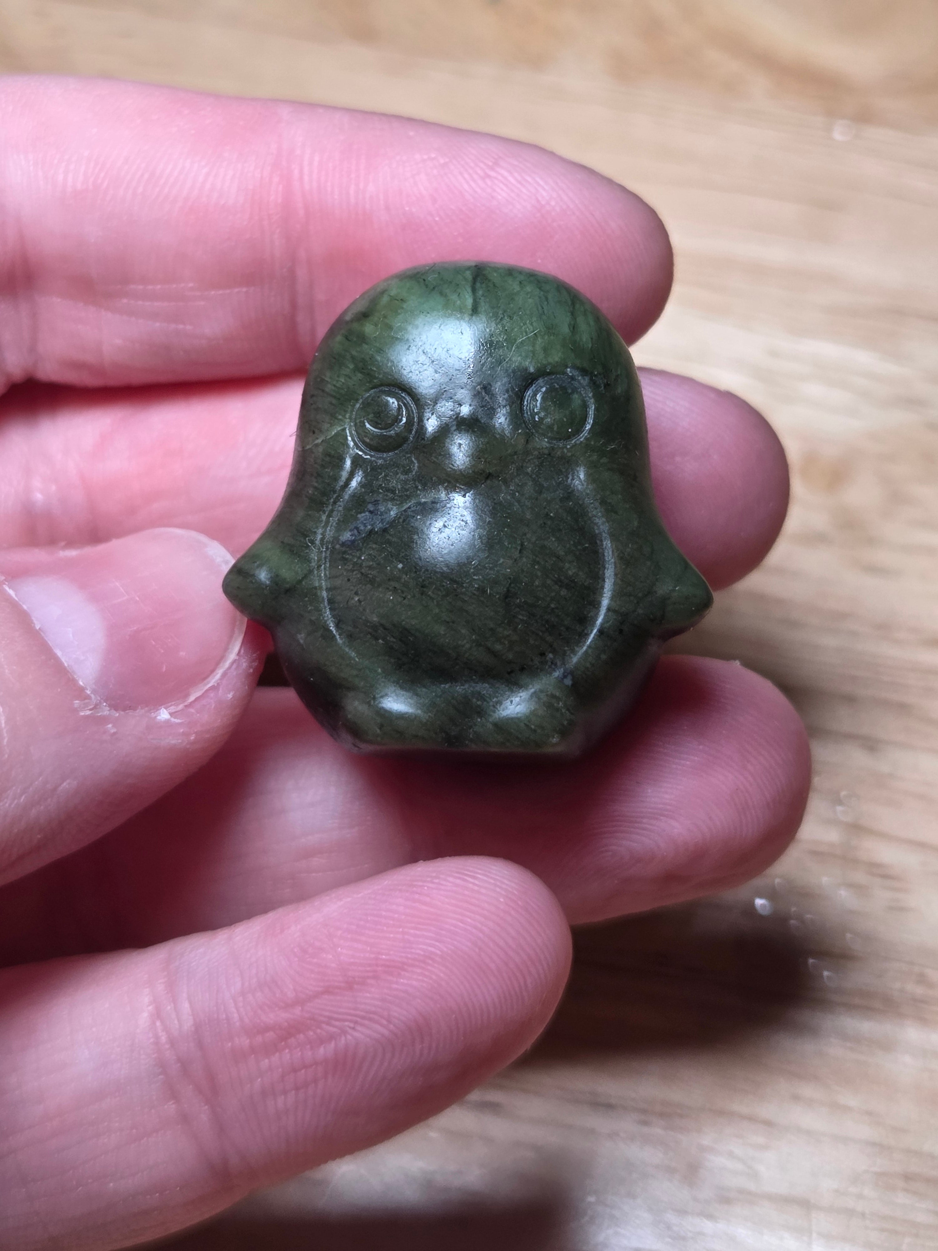 Green jade penguin carving